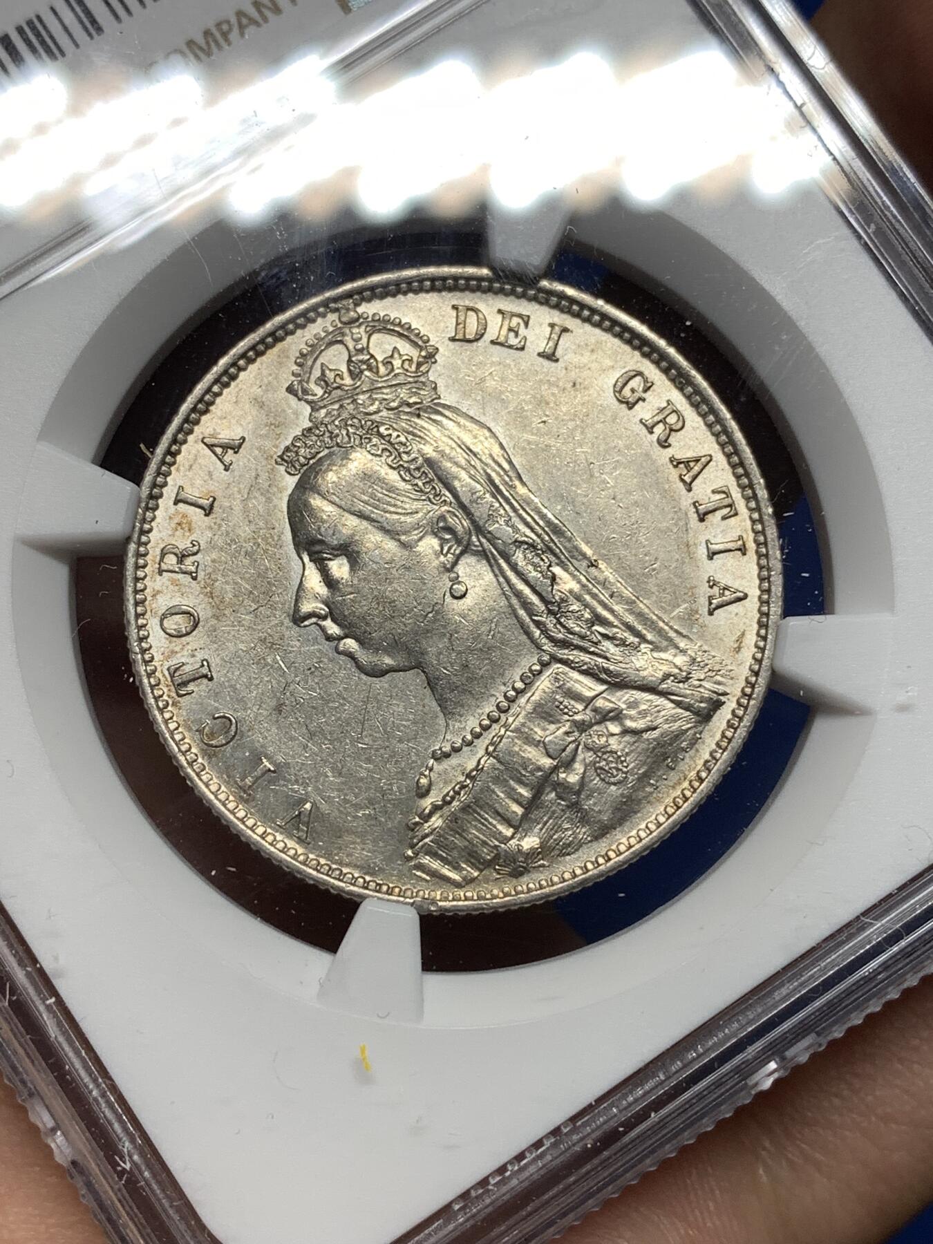 《竞宝斋》第447场 周日，周一，2场连拍 （全场包邮） NGC AU55 英国1887年半克朗银币，背面银光充沛，细节不错。