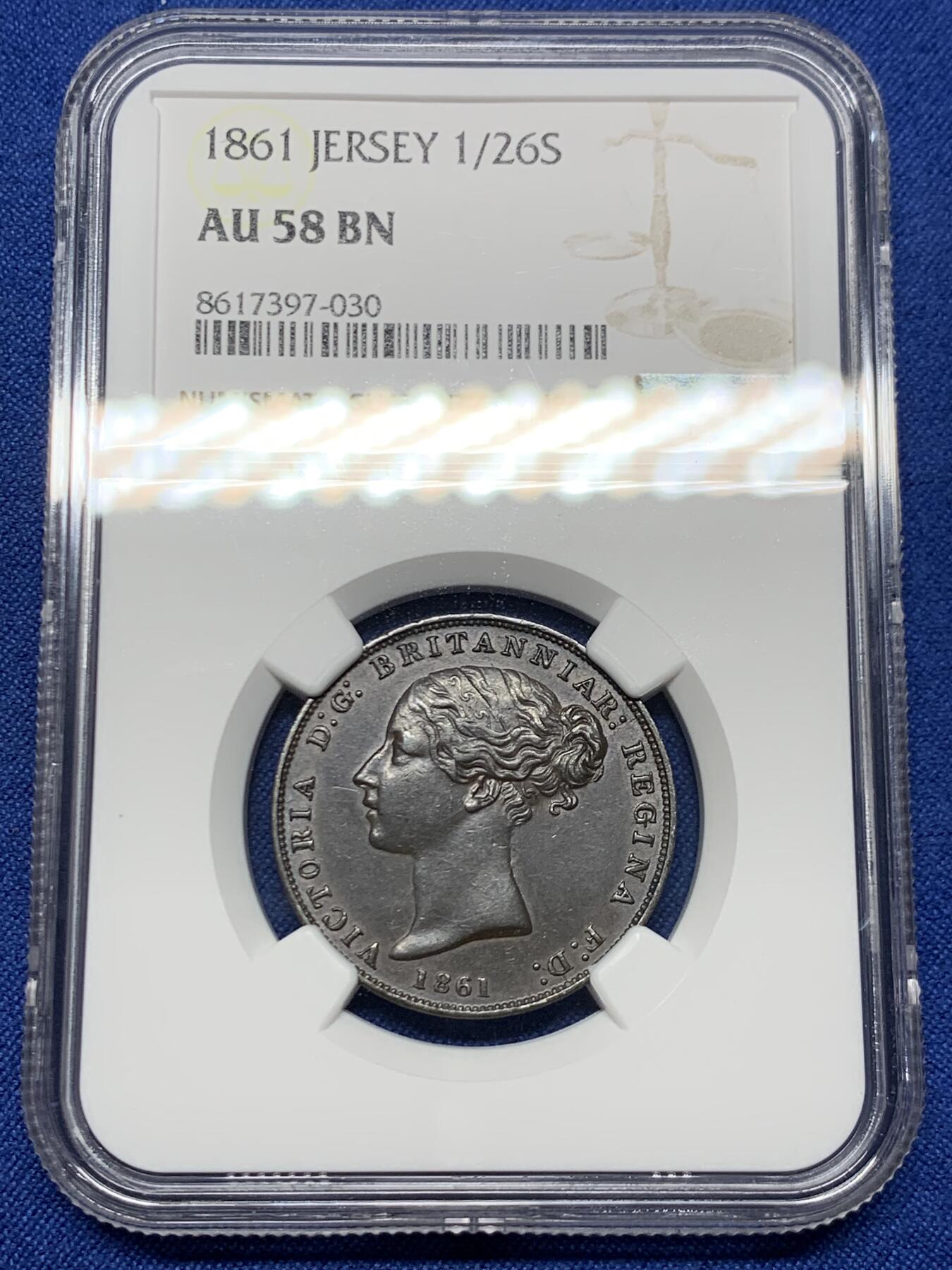 《竞宝斋》第447场 周日，周一，2场连拍 （全场包邮） NGC AU58BN 英属泽西岛1861年1/26先令铜币，后期小维头像，细节良好，巧克力包浆