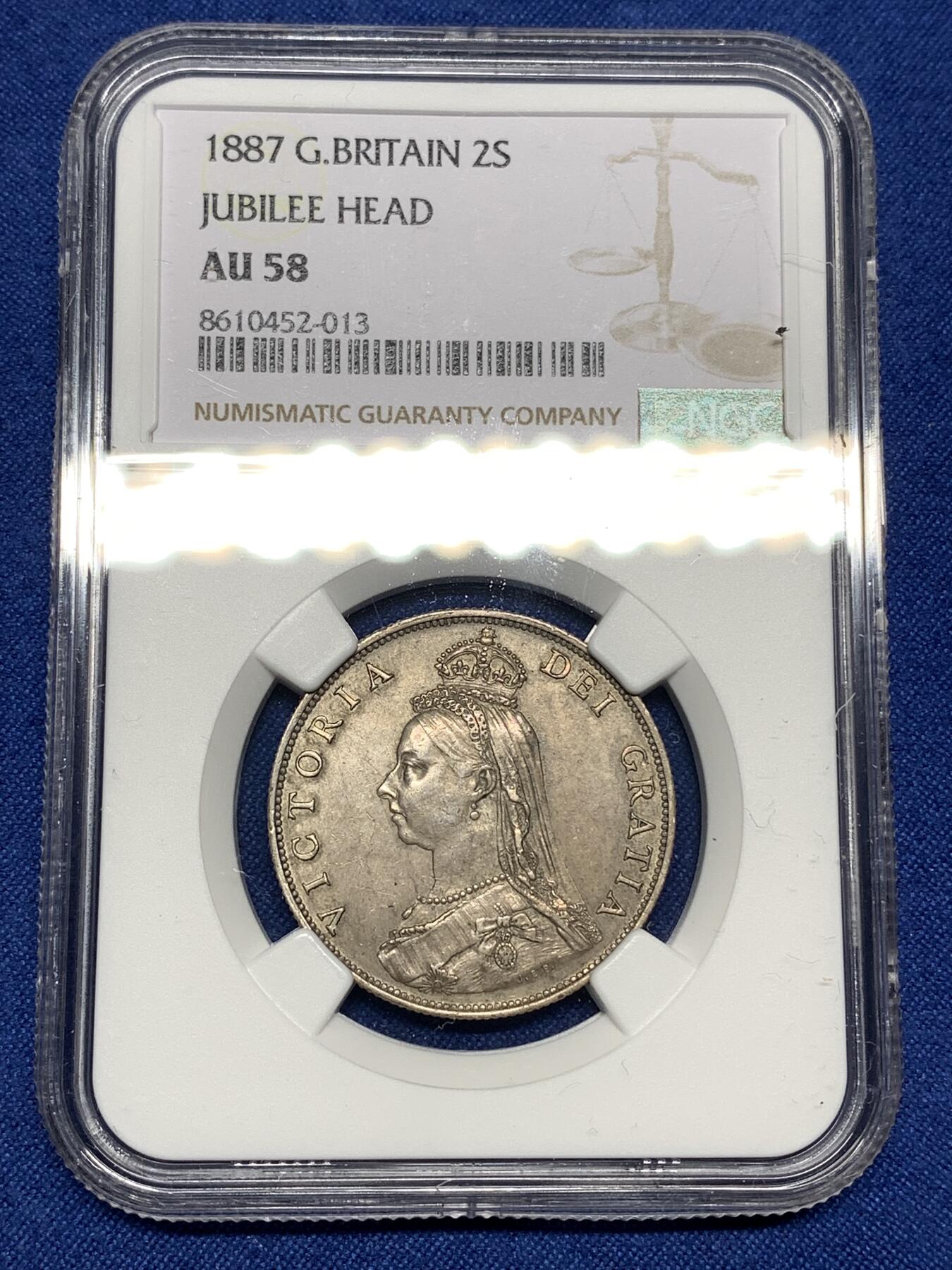 《竞宝斋》第447场 周日，周一，2场连拍 （全场包邮） NGC AU58 英国1887弗洛林银币，经典英伦包浆，略有低评。