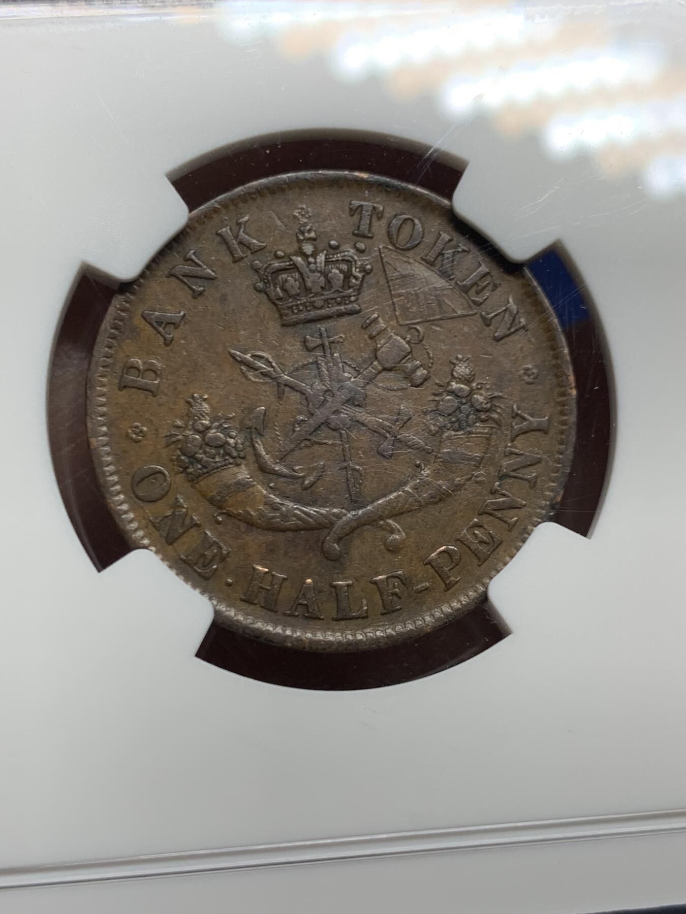 《竞宝斋》第447场 周日，周一，2场连拍 （全场包邮） NGC AU55BN 上加拿大1857半便士银行token，经典马剑设计，这个品种上AU都非常难，铜币爱好者必选