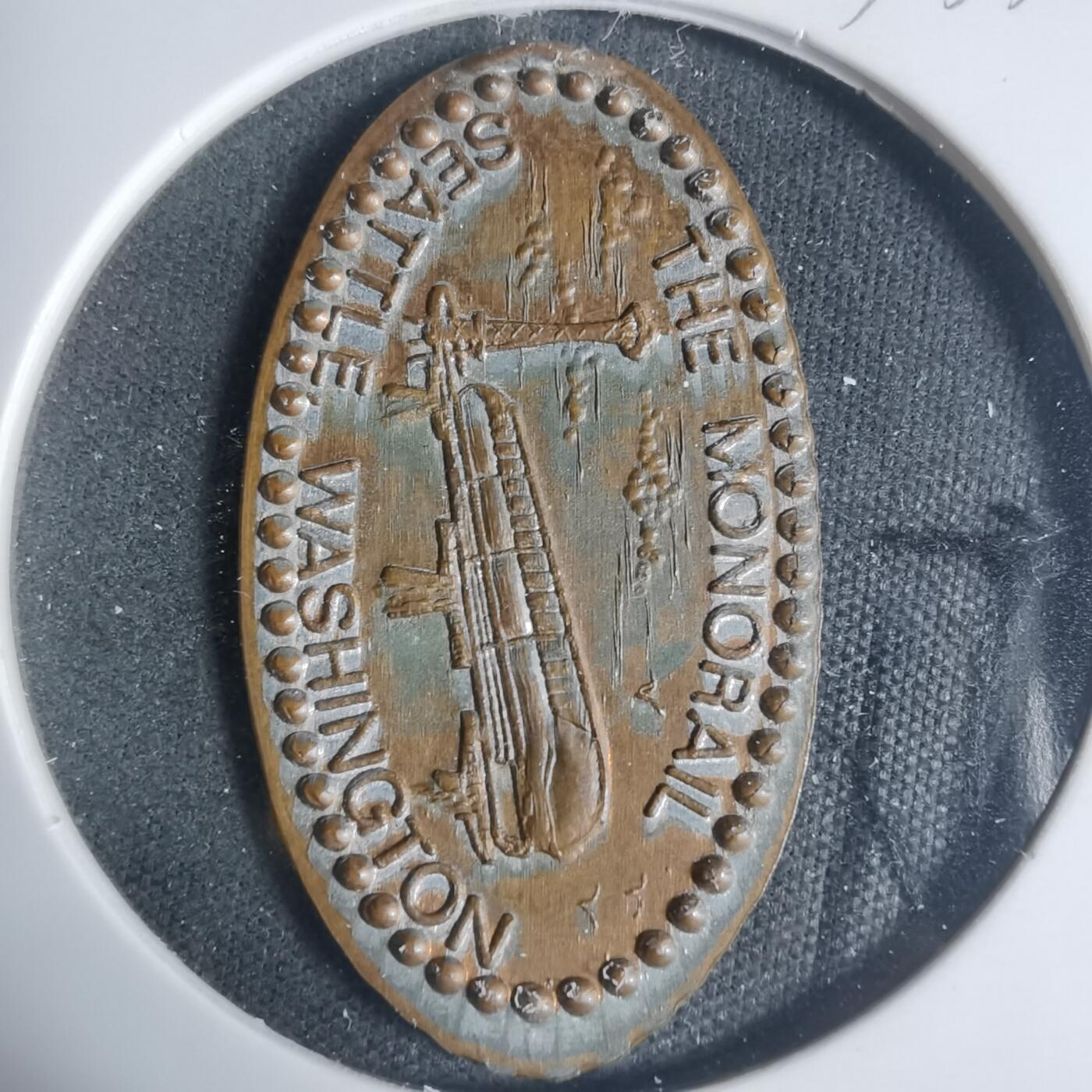 沼泽如烟--第933场 旅游纪念章