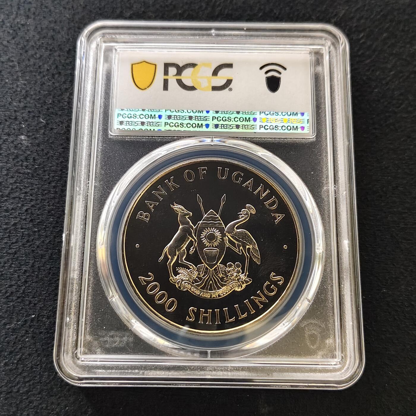 【全场包邮】纯粹捡漏拍487场（免费代拍第24场） 【收藏级·亚军分】乌干达1997年2000先令女王金婚克朗型纪念币-PCGS MS66（更高分仅1枚）
