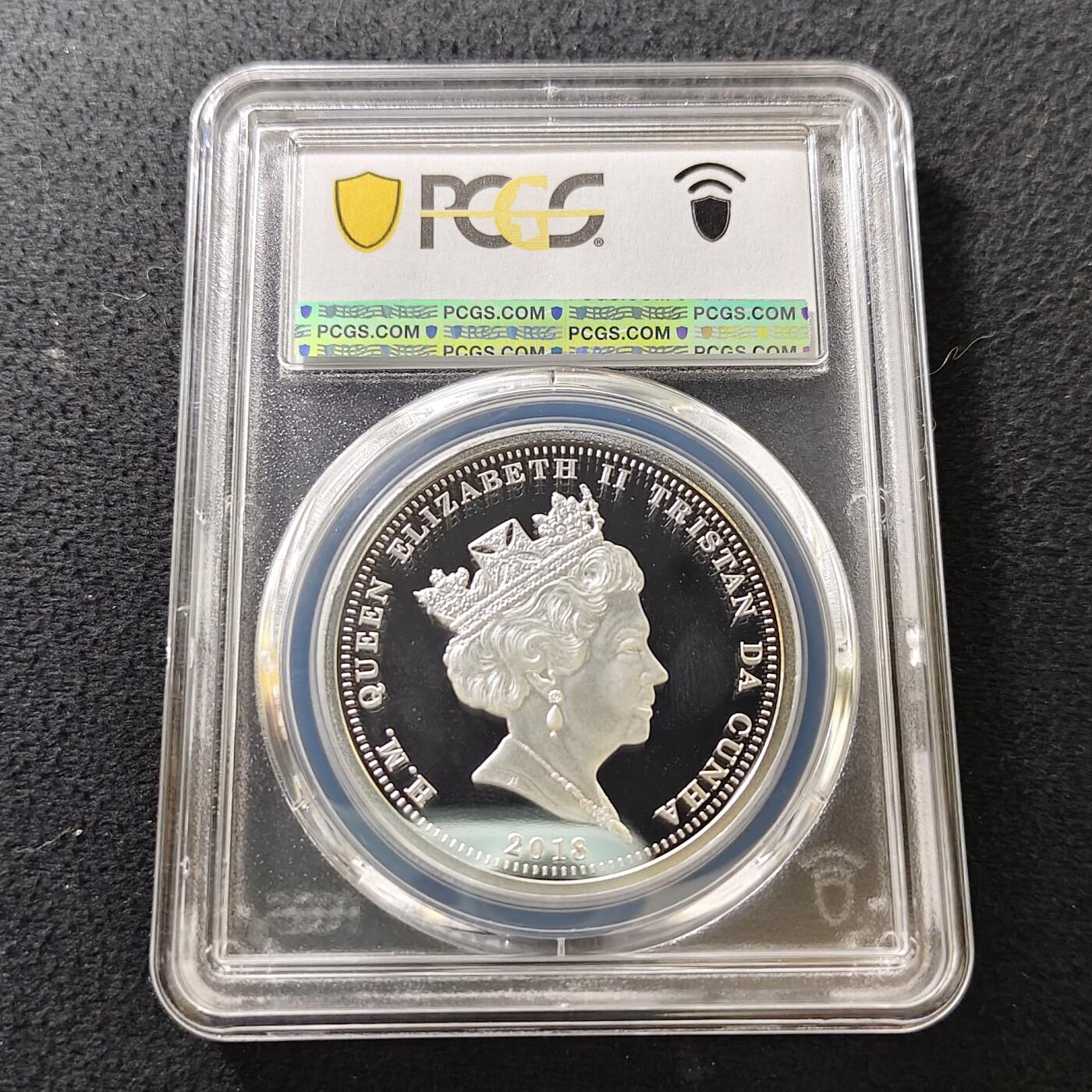 【全场包邮】纯粹捡漏拍487场（免费代拍第24场） 【收藏级·冠军分·少见】英属特里斯坦和达库尼亚2018年1克朗女王加冕65周年精制镀银局部镀金克朗型纪念币-量9999-PCGS PR69 DCAM