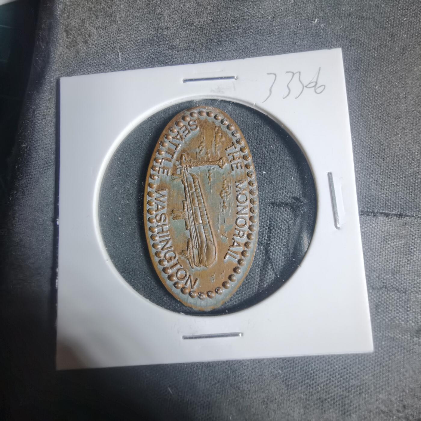 沼泽如烟--第933场 旅游纪念章