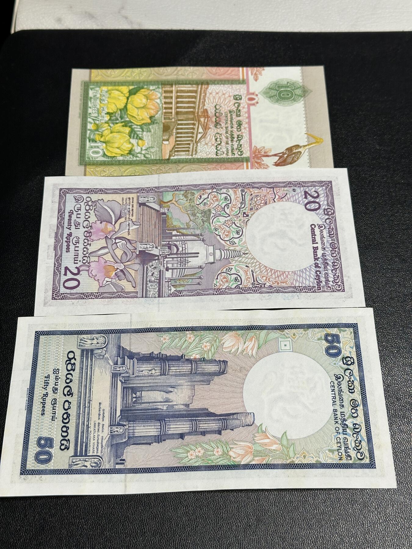 《外钞收藏家》第五百九十四期（畅拍场）（本平台长期征集拍品、欢迎藏友们联系合作） 斯里兰卡BWC版10、20、50卢比3张全新 50卢比有潮斑