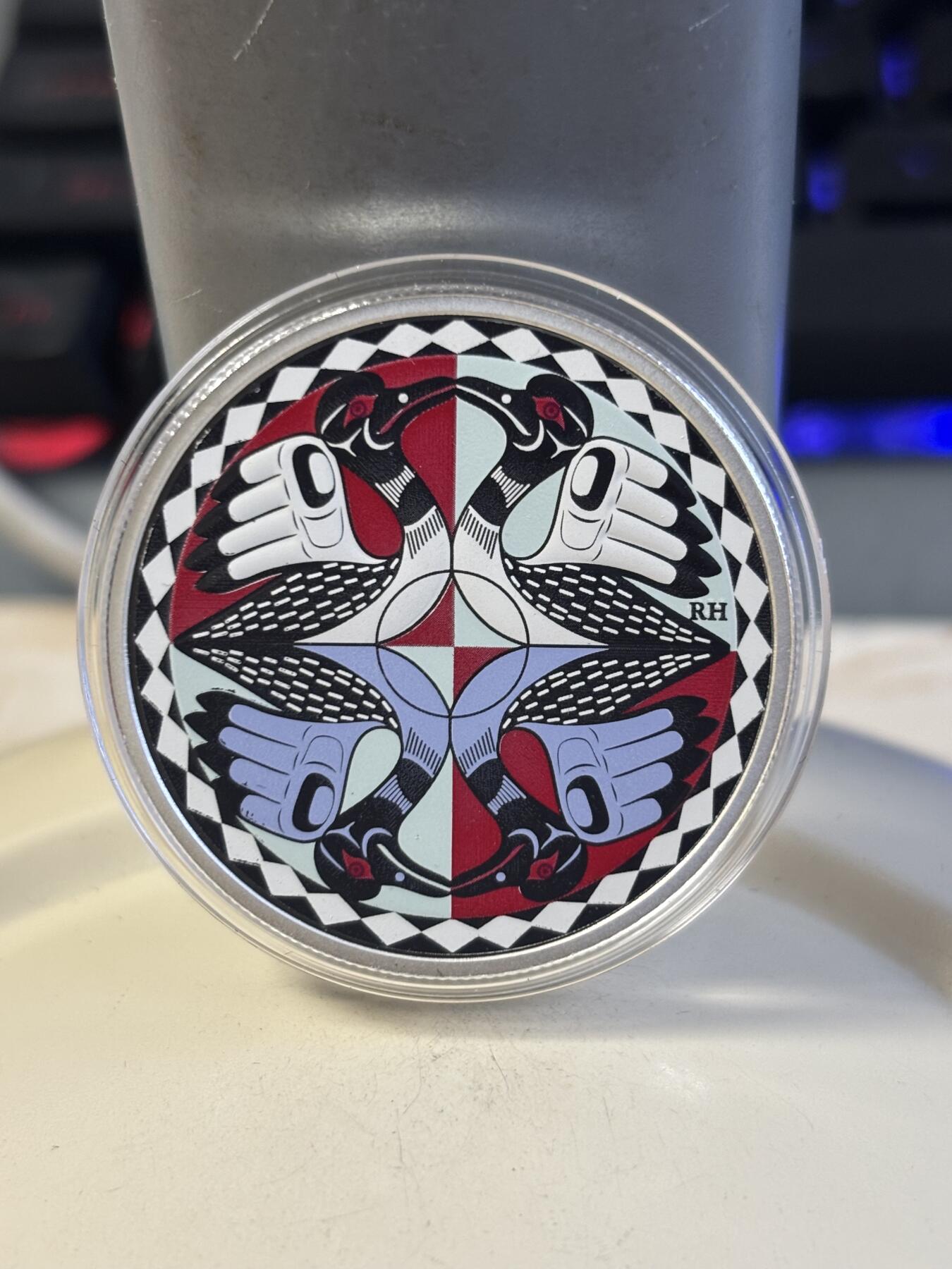 第186期拍卖 加拿大2012彩印潜水鸟标志性加元发行25周年1盎司银币，9999银，发行10000枚