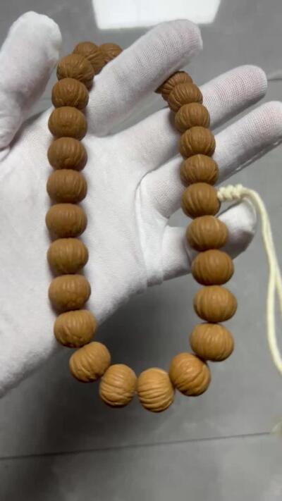 零元拍：W1 猴头凤羽14.5MM原生态手串 手持