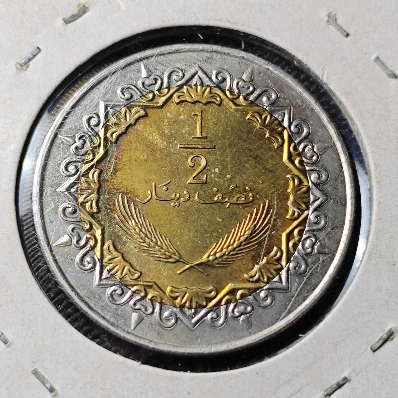 KK钱币收藏小铺 第380期  2月预留时间 周末发货  利比亚1/2第纳尔双色币 好品