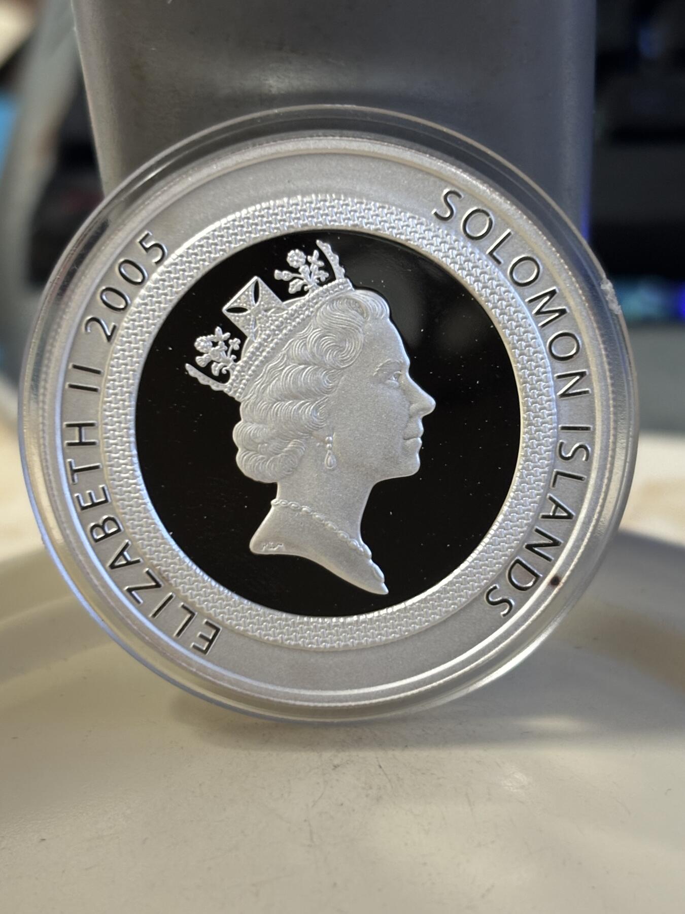 第186期拍卖 所罗门2005年发行2006年世界杯幻彩1盎司纪念银币带盒证书，999银，