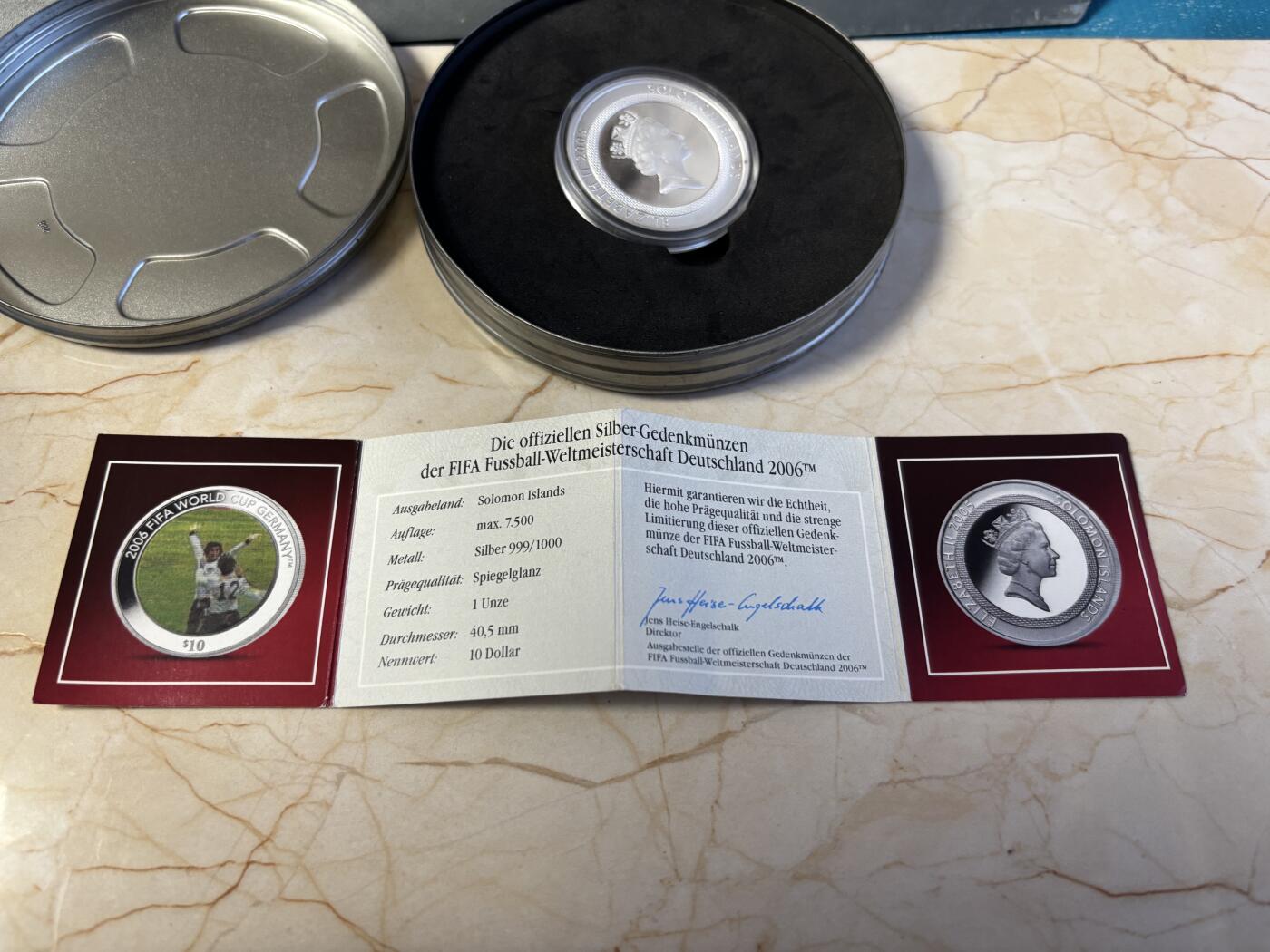第186期拍卖 所罗门2005年发行2006年世界杯幻彩1盎司纪念银币带盒证书，999银，