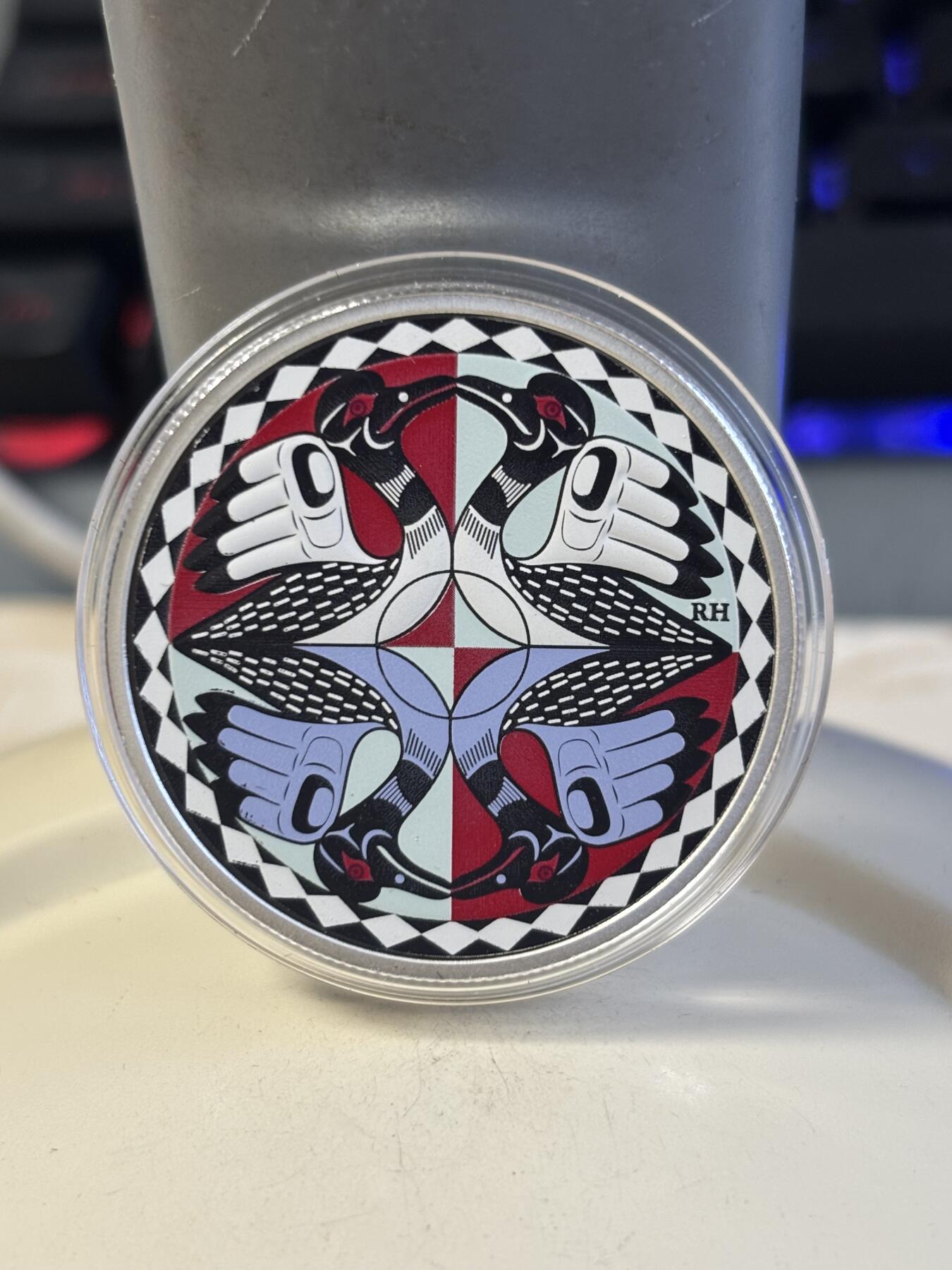 第186期拍卖 加拿大2012彩印潜水鸟标志性加元发行25周年1盎司银币，9999银，发行10000枚