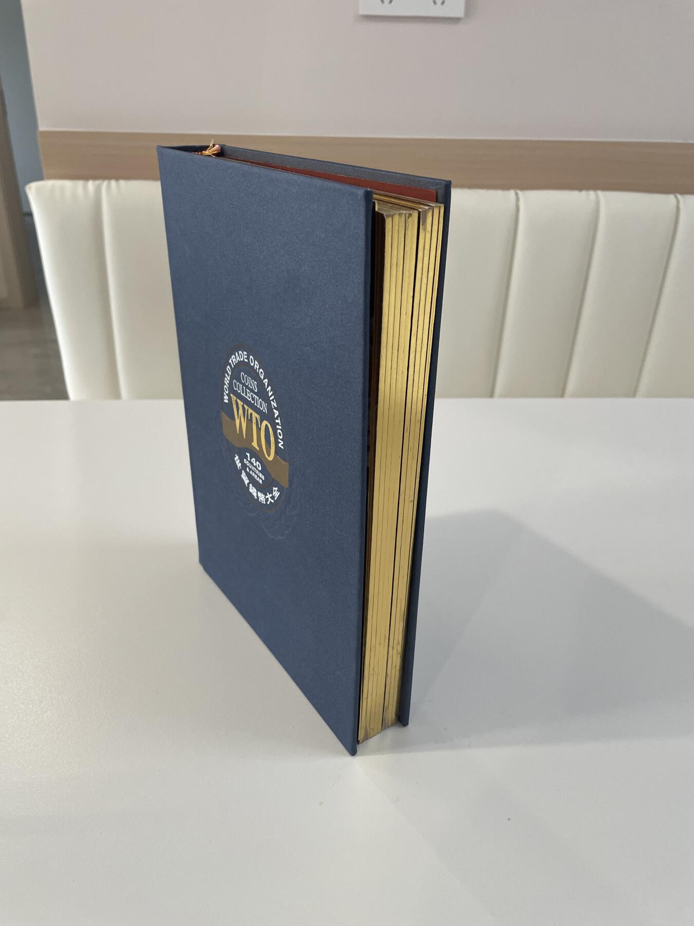 回流1215 中国钱币公司2000年发行 世界贸易组织120个成员国硬币 小日本2002年3000元购于北京通州邮政局集邮门市部（附收据）