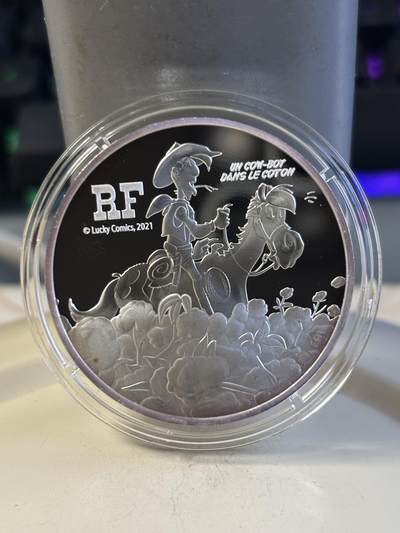 第186期拍卖 - 法国2021年幸运的路克75周年高棉牛仔10欧元纪念银币，999银，22.2克，发行3000枚，有氧化