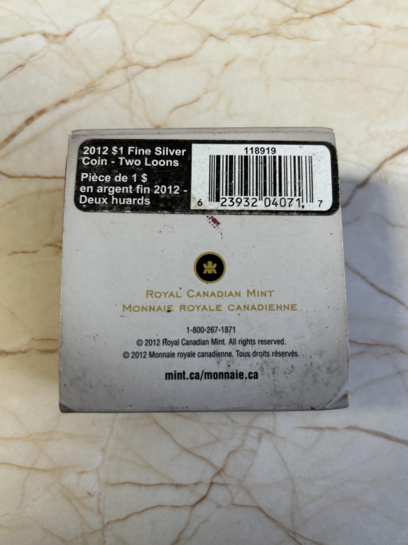 第186期拍卖 加拿大2012彩印潜水鸟标志性加元发行25周年1盎司银币，9999银，发行10000枚