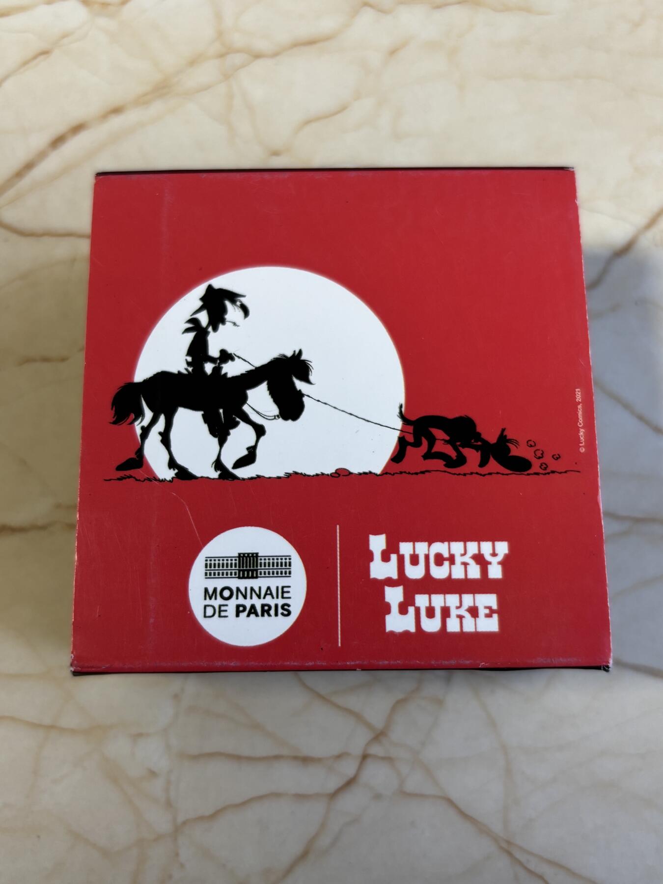 第186期拍卖 法国2021年幸运的路克75周年高棉牛仔10欧元纪念银币，999银，22.2克，发行3000枚，有氧化