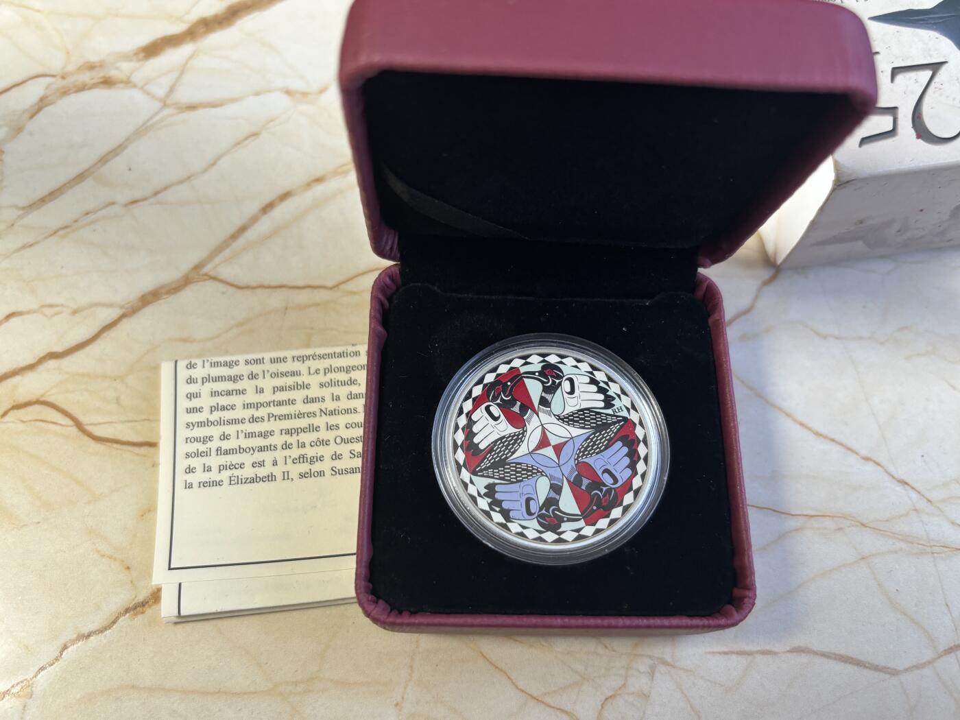 第186期拍卖 加拿大2012彩印潜水鸟标志性加元发行25周年1盎司银币，9999银，发行10000枚