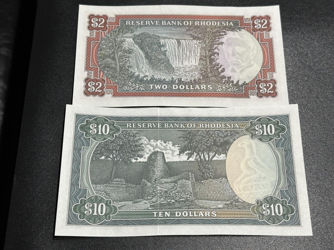 《外钞收藏家》第五百九十四期（畅拍场）（本平台长期征集拍品、欢迎藏友们联系合作） 罗得西亚2和10刀 2张一起 全新UNC