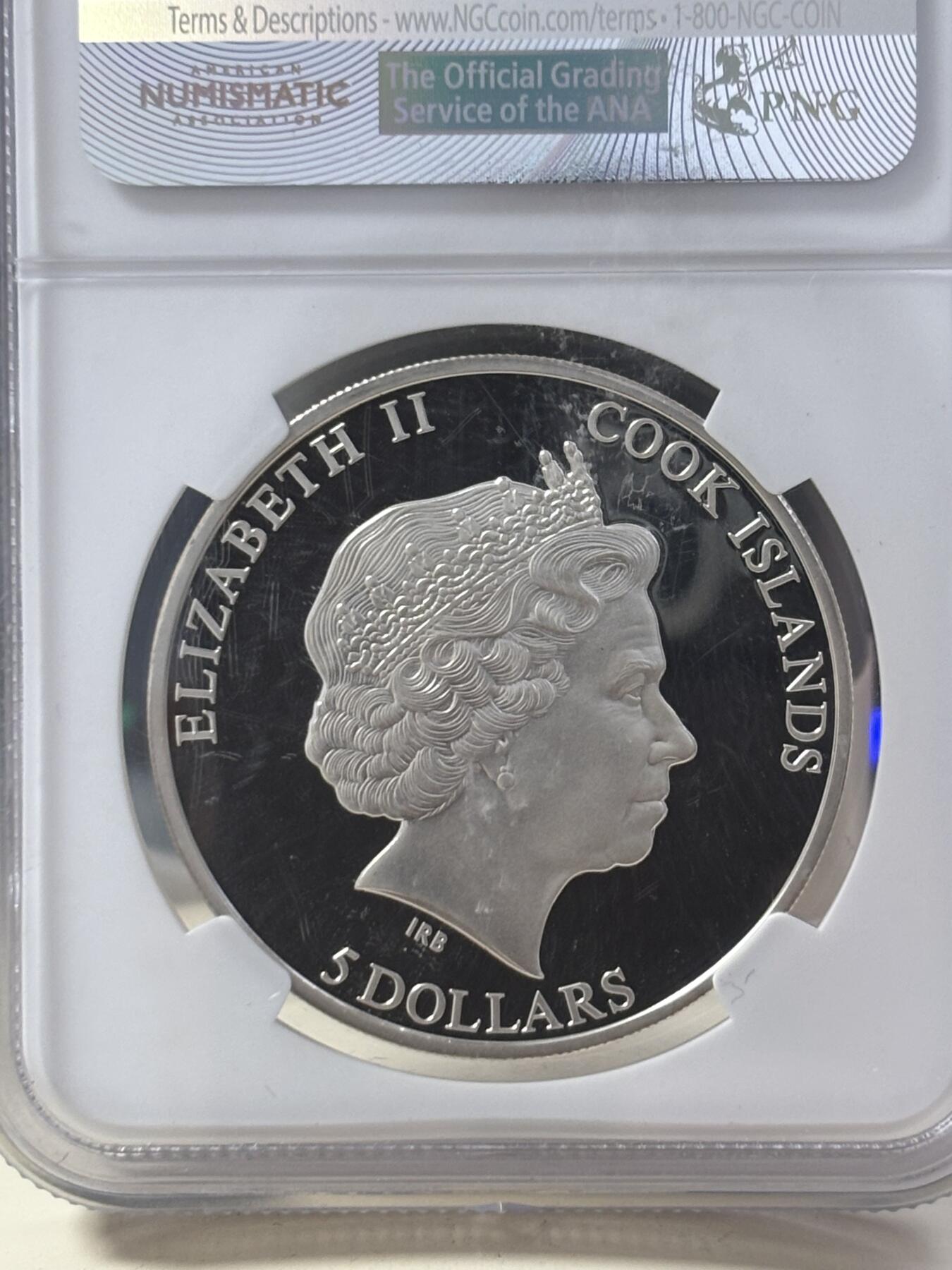 第186期拍卖 库克2011年镶嵌摩尼欧纳路塔镍铁陨石纪念彩色银币NGC-PF69,925银，20克，发行2500枚