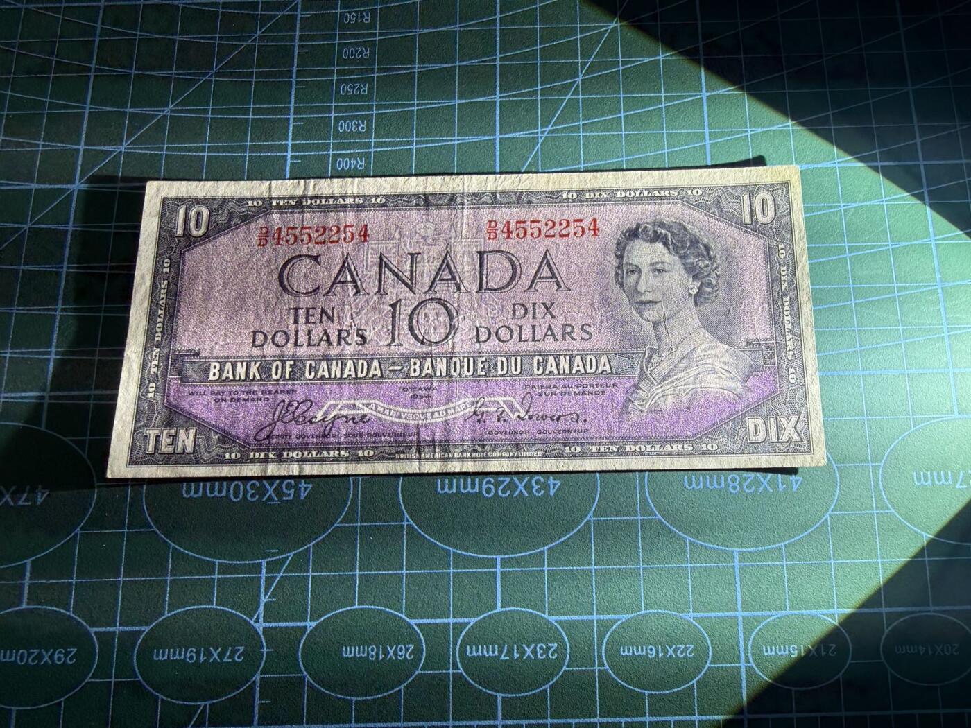 【炜奕收藏】，第五十三期 1954年加拿大10元，品相如图，魔鬼脸版