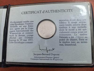 长老汇蛇年精选第八十二场拍卖 - 1977东方快车（法国至土耳其，因阿加莎·克里斯蒂的小说《东方快车的谋杀案》闻名）最后的班车邮币封首日封，含银章一枚，带册有开裂