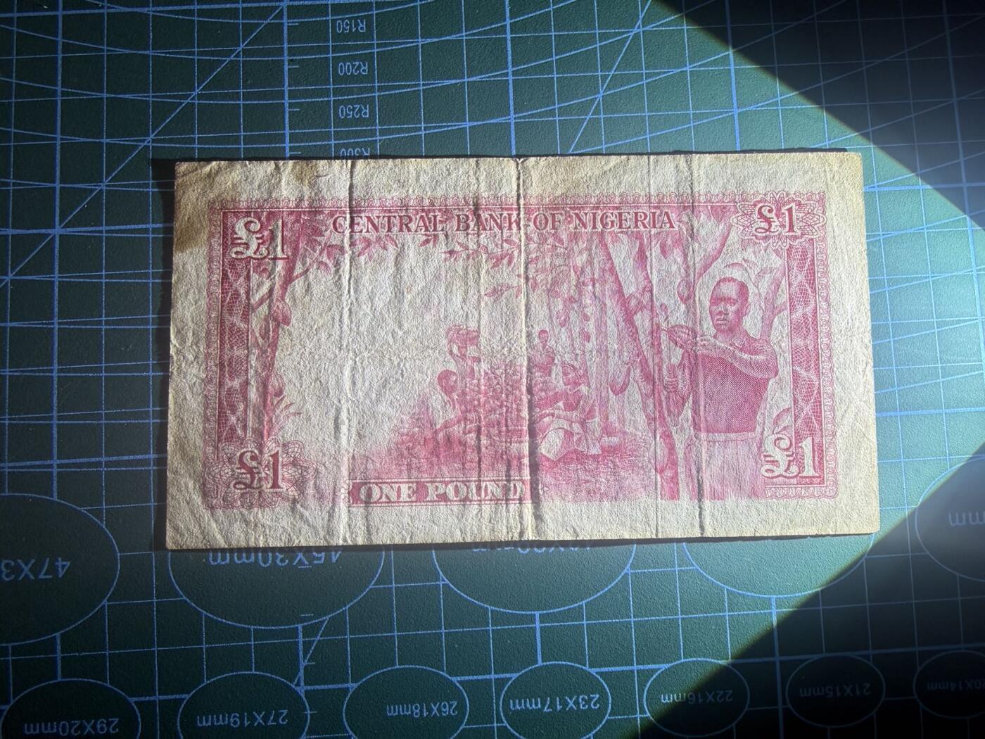 【炜奕收藏】，第五十三期 1958年尼日利亚1镑，品相如图，号码无47