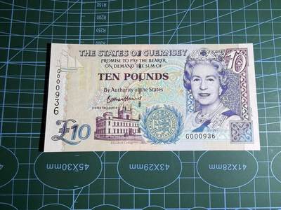 【炜奕收藏】，第五十三期 - 2015年根西岛10镑，UNC品相，号码无47百位号