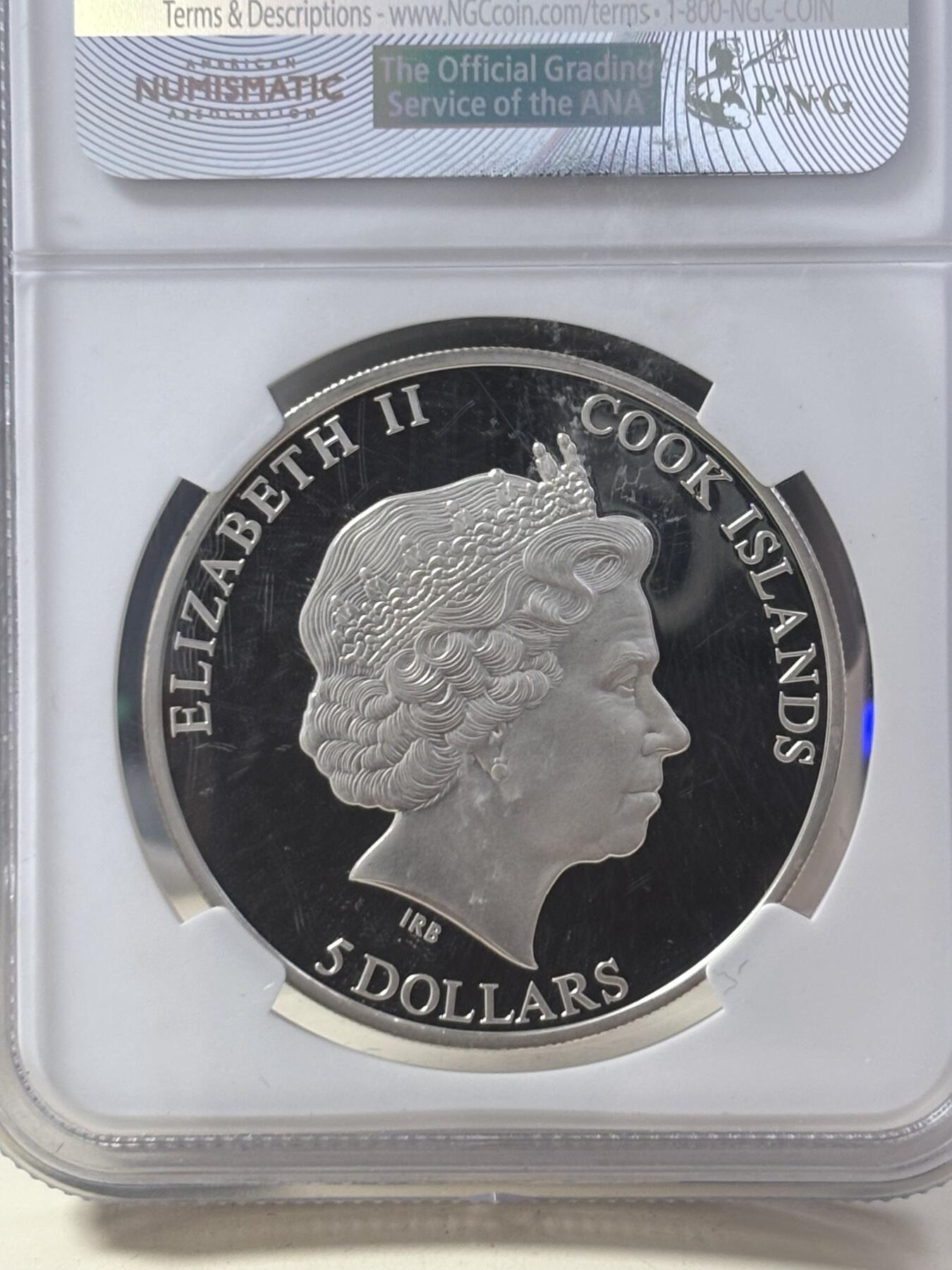 第186期拍卖 库克2011年镶嵌摩尼欧纳路塔镍铁陨石纪念彩色银币NGC-PF69,925银，20克，发行2500枚