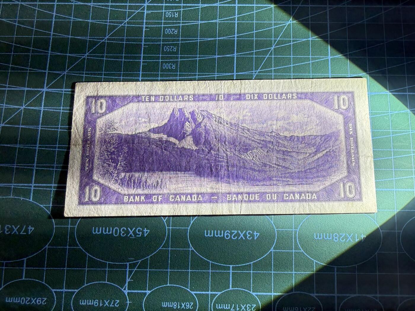 【炜奕收藏】，第五十三期 1954年加拿大10元，品相如图，魔鬼脸版