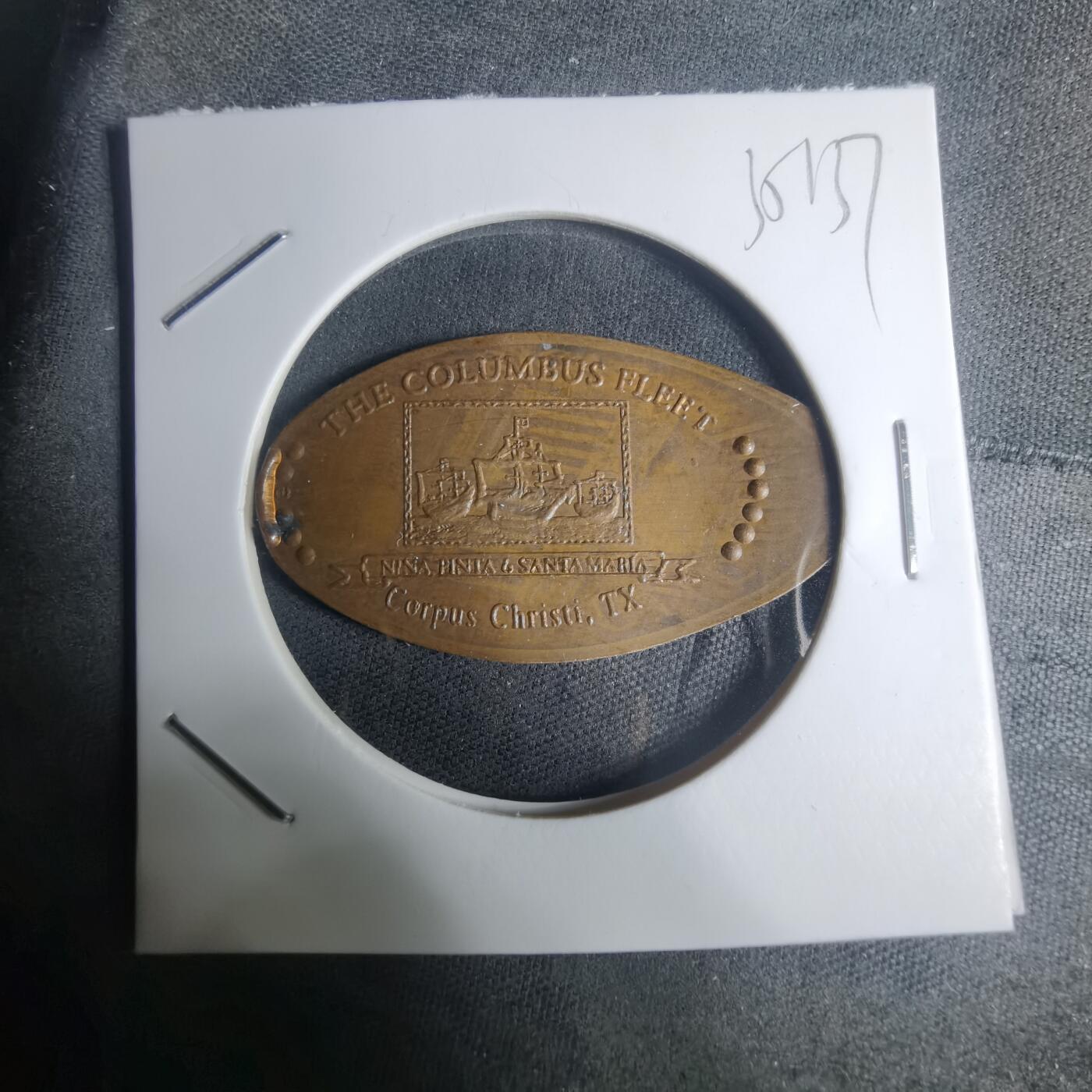 沼泽如烟--第935场 旅游纪念章