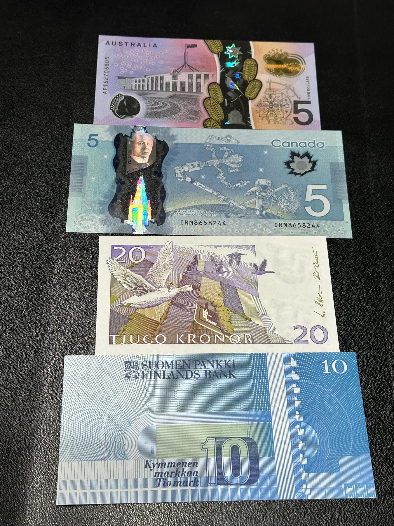《外钞收藏家》第五百九十四期（畅拍场）（本平台长期征集拍品、欢迎藏友们联系合作） 澳大利亚5元、加拿大5元、瑞典20克朗（轻微潮点）、芬兰10马克 四张一起 全新UNC