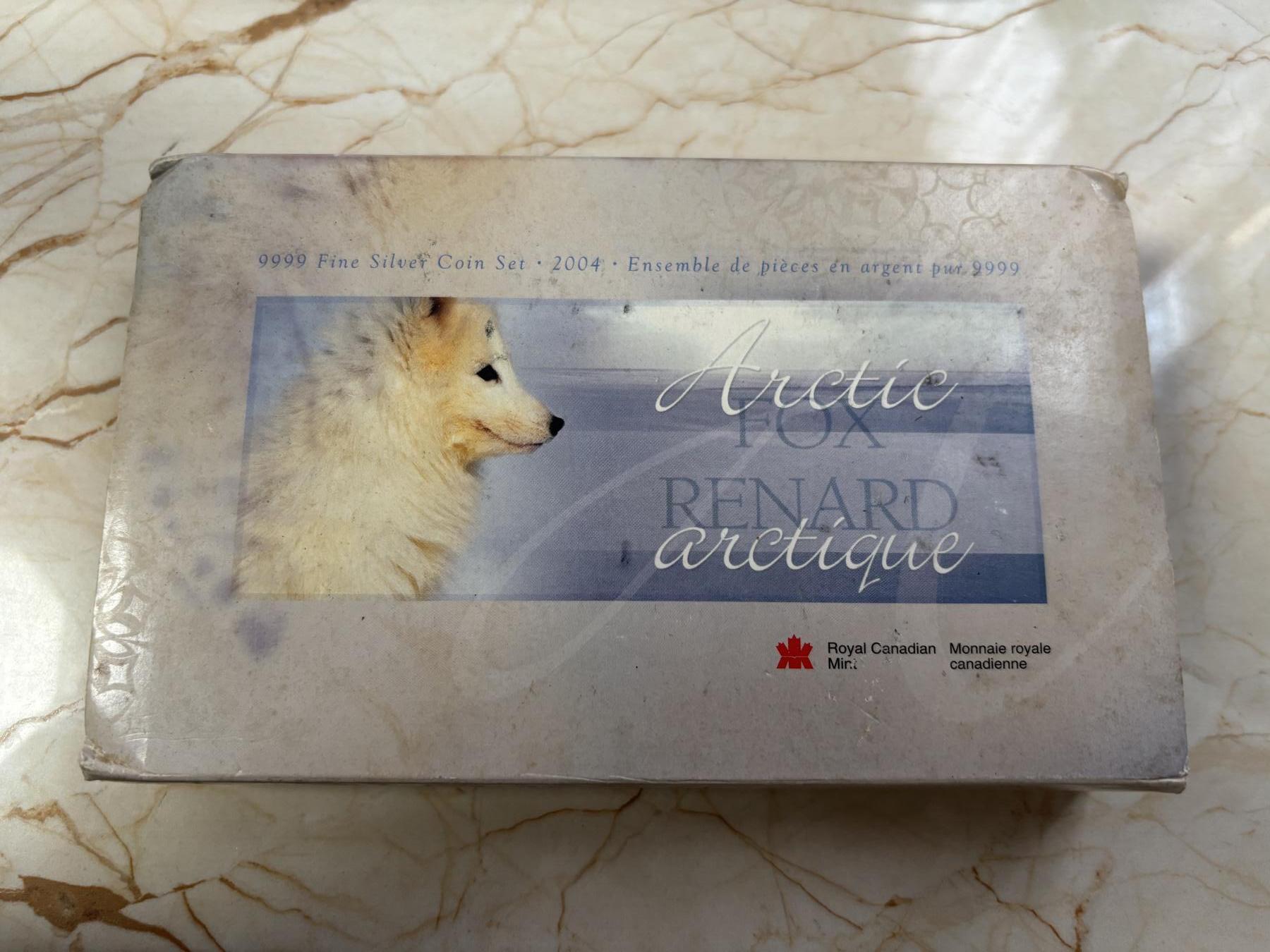 第185期拍卖 加拿大2004年2/3/4/5元精制银币套 北极狐 1/10，1/4，1/2，1盎司9999银 发行量：2万 盒证全