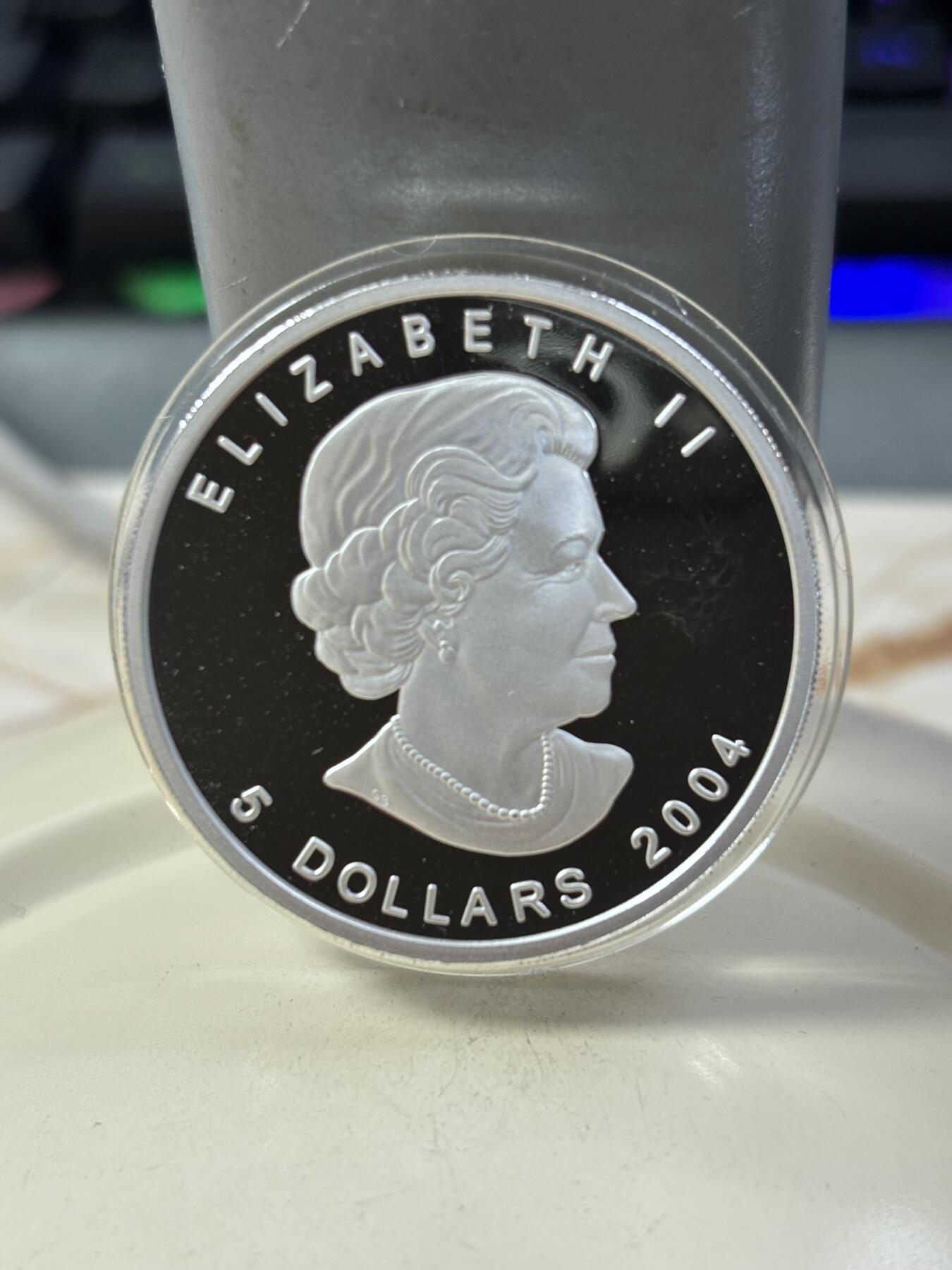 第185期拍卖 加拿大2004年2/3/4/5元精制银币套 北极狐 1/10，1/4，1/2，1盎司9999银 发行量：2万 盒证全