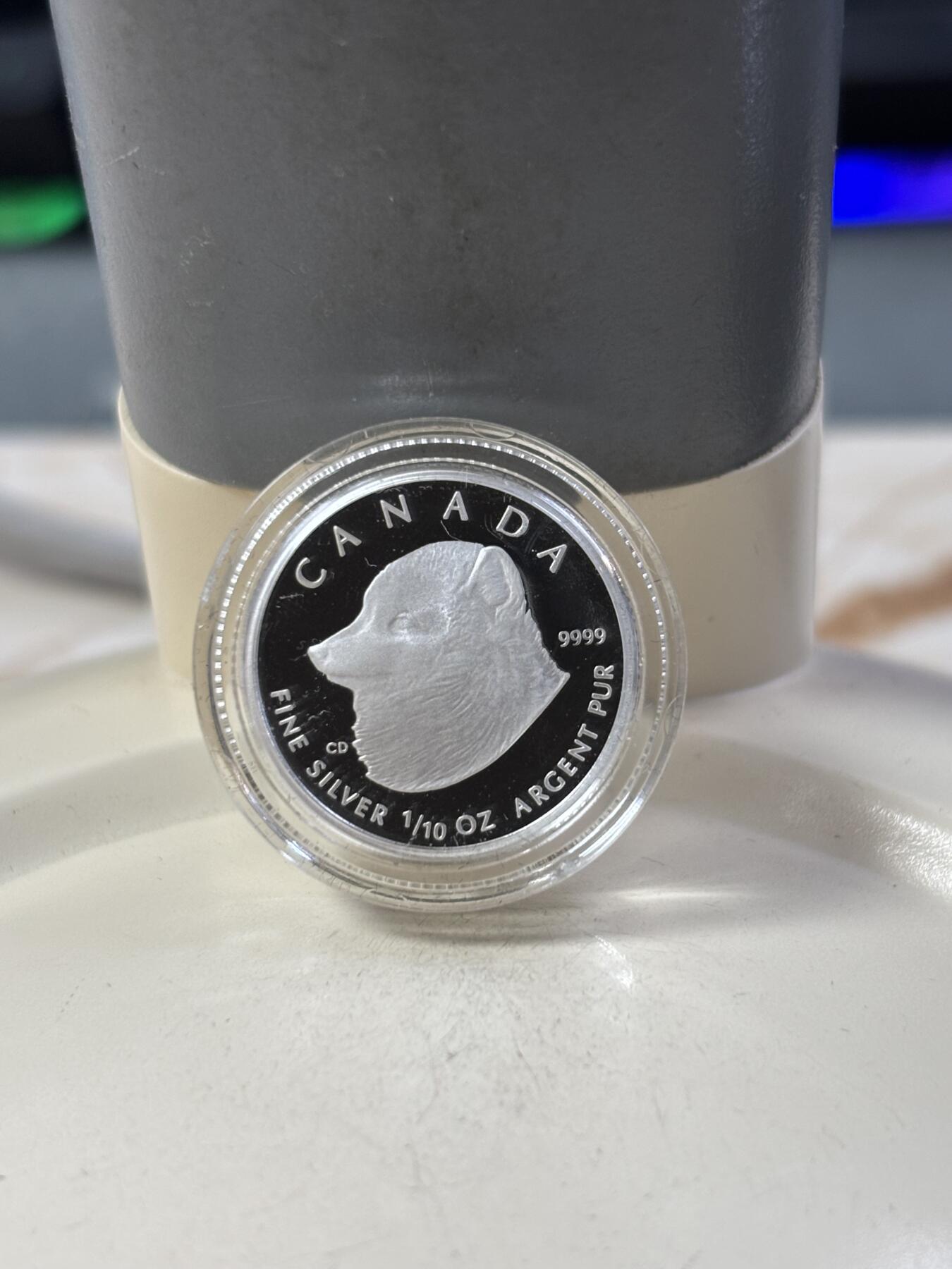 第185期拍卖 加拿大2004年2/3/4/5元精制银币套 北极狐 1/10，1/4，1/2，1盎司9999银 发行量：2万 盒证全