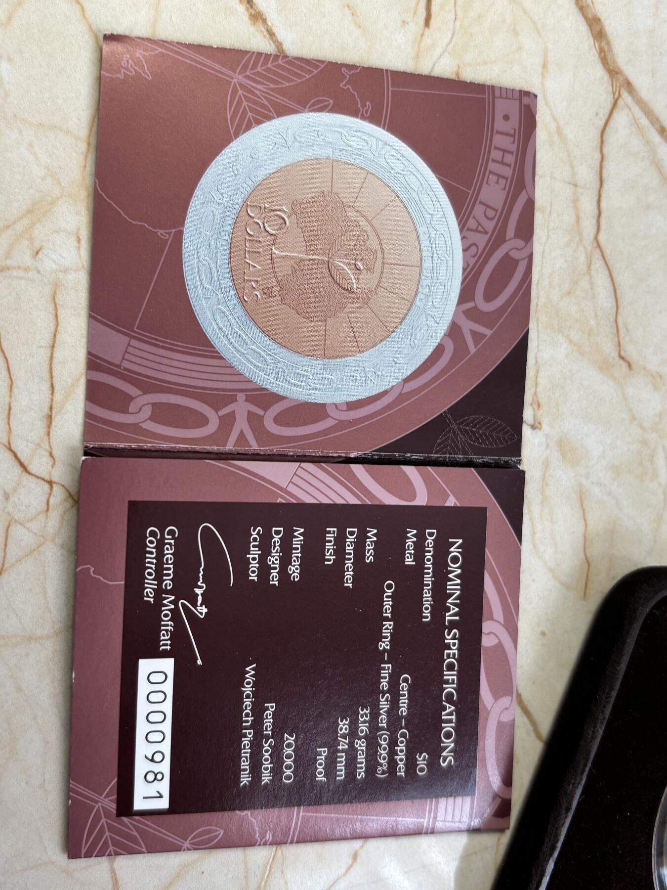 第185期拍卖 澳大利亚1999年10元精制双金属银币 千禧年系列-过去 内芯铜 外圈999银 33.6克 发行量：2万 盒证全