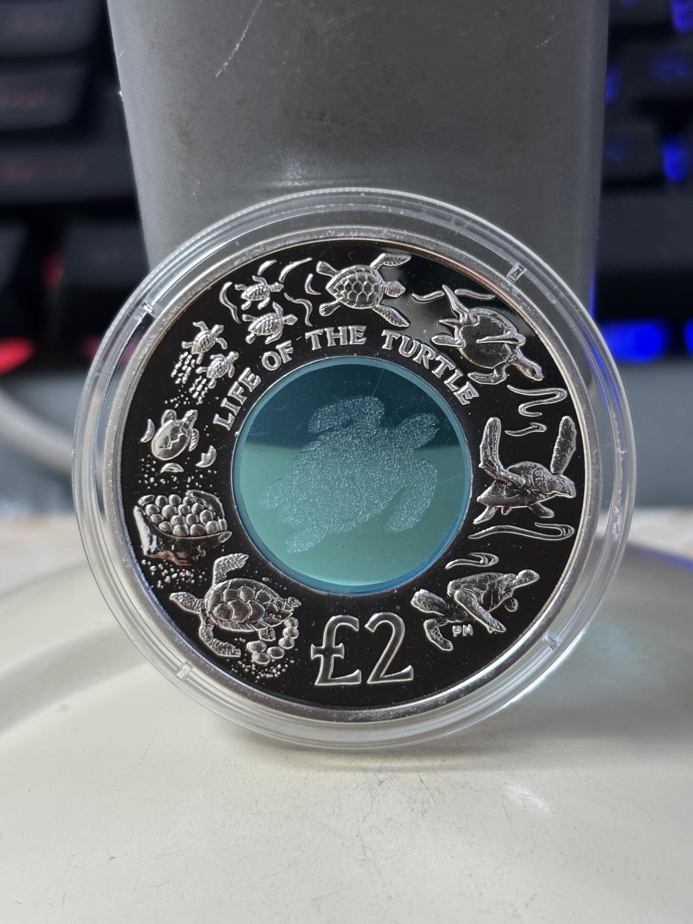 第186期拍卖 双获奖币英属印度洋领地2009年海龟水晶镶嵌银币，925银+水晶，23.45克，发行量5000枚，获世界最美25种钱币之一和克劳斯最佳创意币大奖！