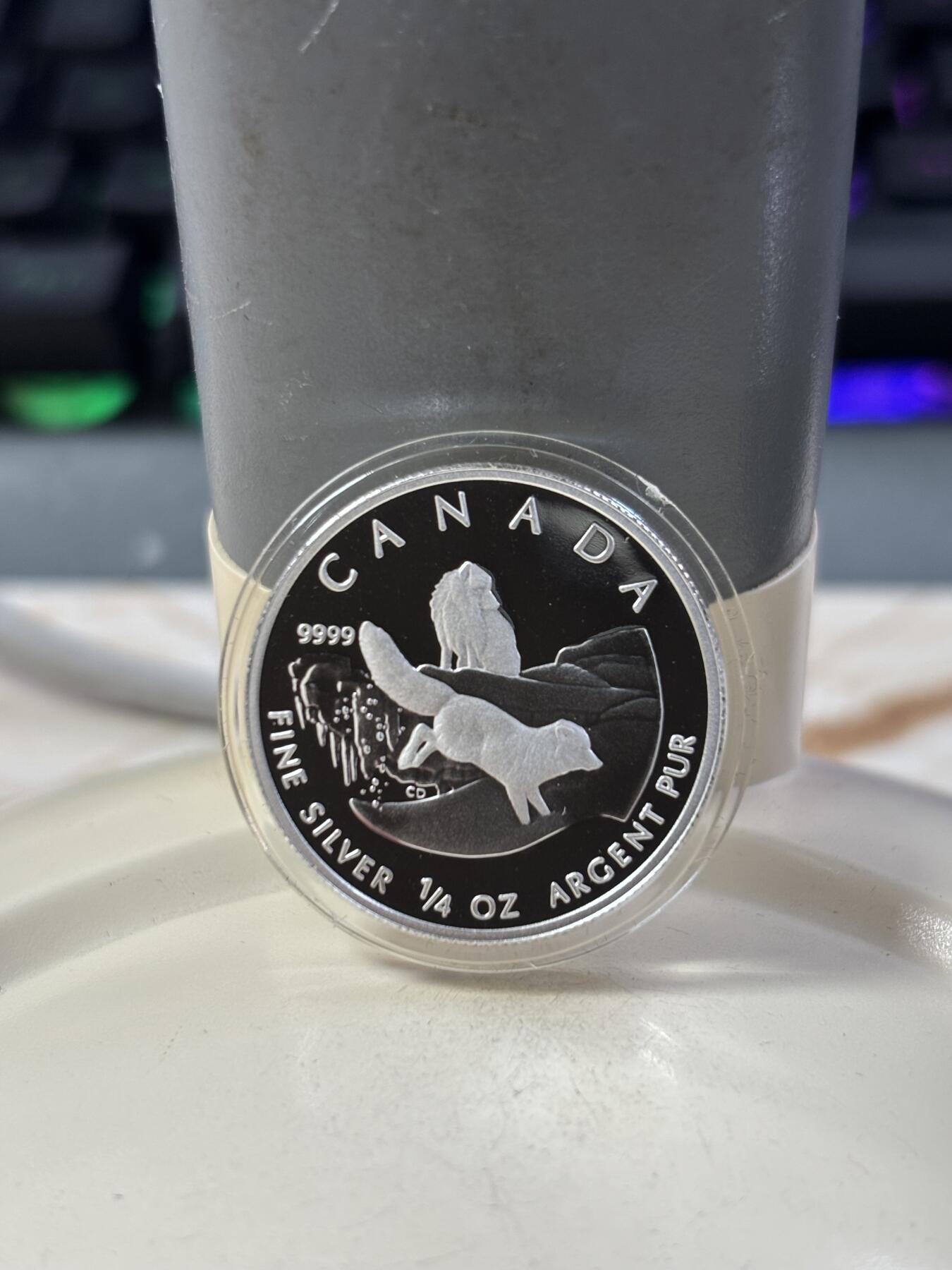 第185期拍卖 加拿大2004年2/3/4/5元精制银币套 北极狐 1/10，1/4，1/2，1盎司9999银 发行量：2万 盒证全