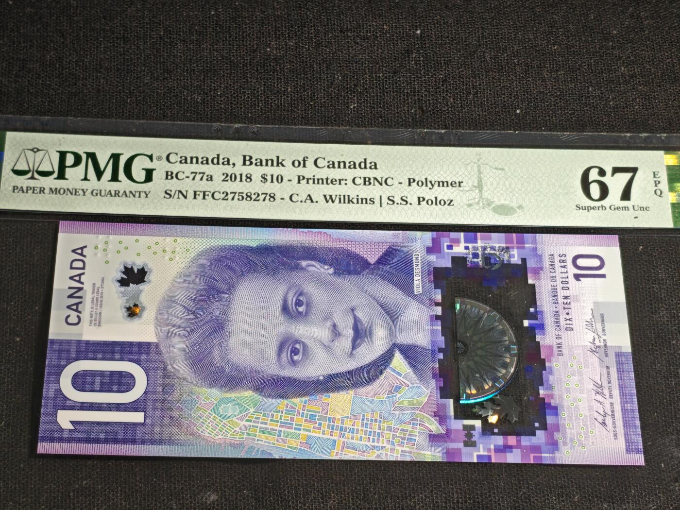 刘世昌艺术品销售中心～虎踞龙蟠*金杨在线联拍群第512期 加拿大2018年10元（PMG 67E 号码：FFC2758278）1枚。此币荣获当年IBNS世界纸币大奖赛“最佳纸币”大奖。