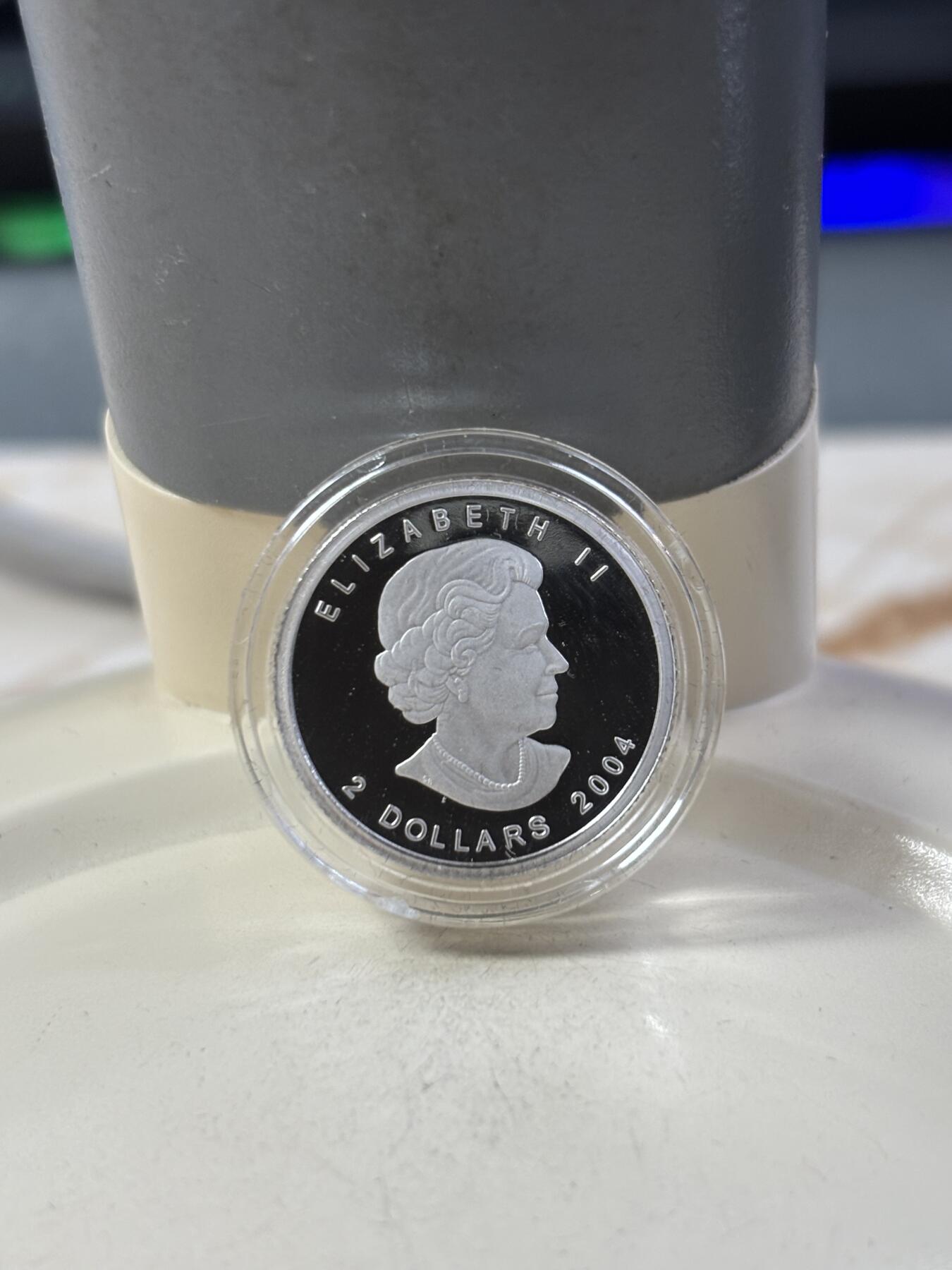 第185期拍卖 加拿大2004年2/3/4/5元精制银币套 北极狐 1/10，1/4，1/2，1盎司9999银 发行量：2万 盒证全