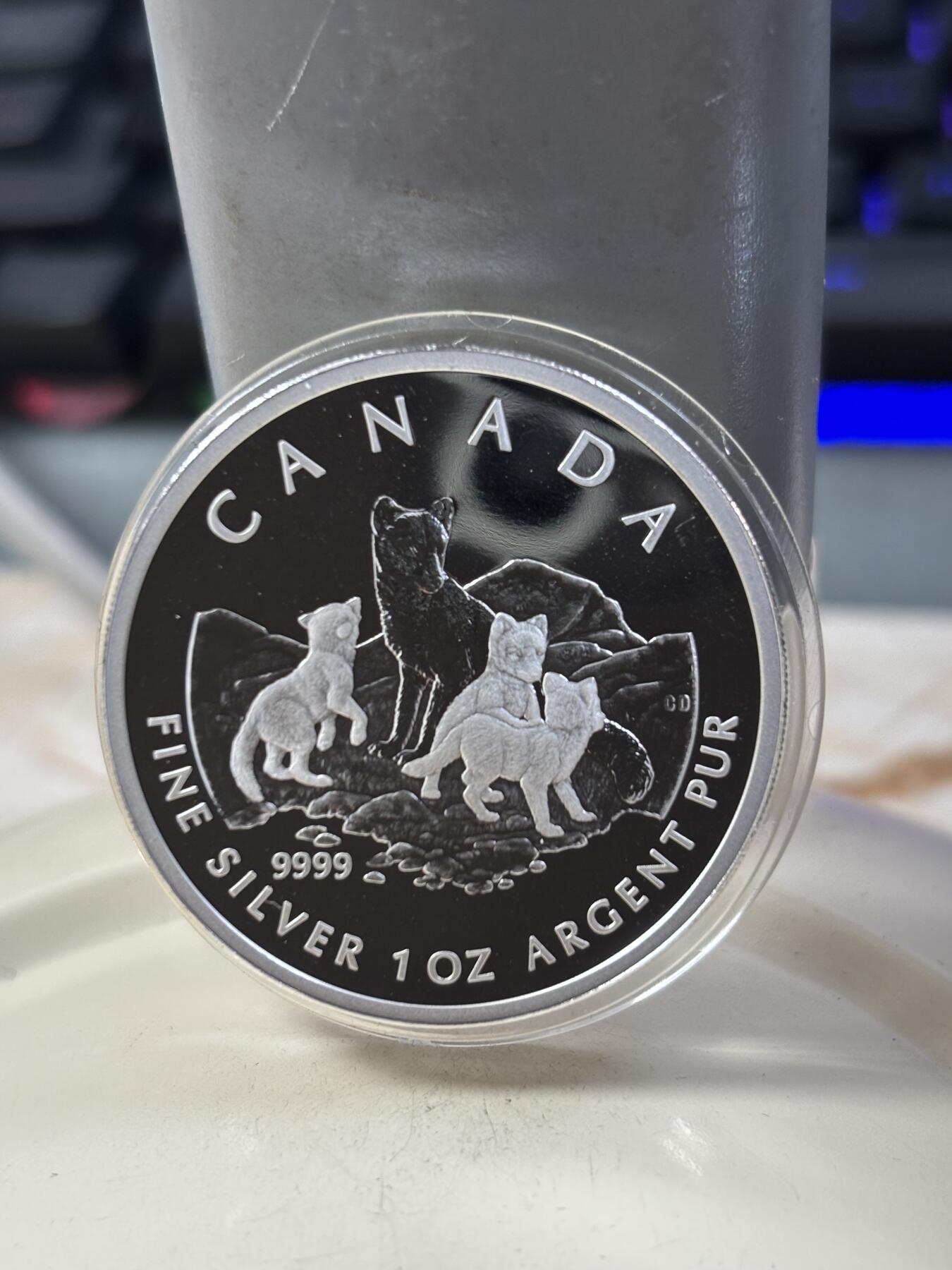 第185期拍卖 加拿大2004年2/3/4/5元精制银币套 北极狐 1/10，1/4，1/2，1盎司9999银 发行量：2万 盒证全