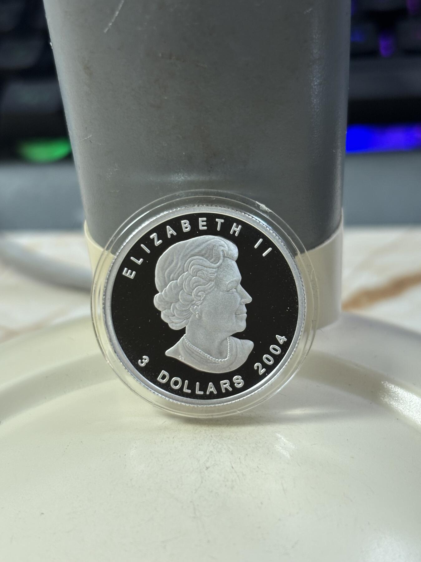 第185期拍卖 加拿大2004年2/3/4/5元精制银币套 北极狐 1/10，1/4，1/2，1盎司9999银 发行量：2万 盒证全