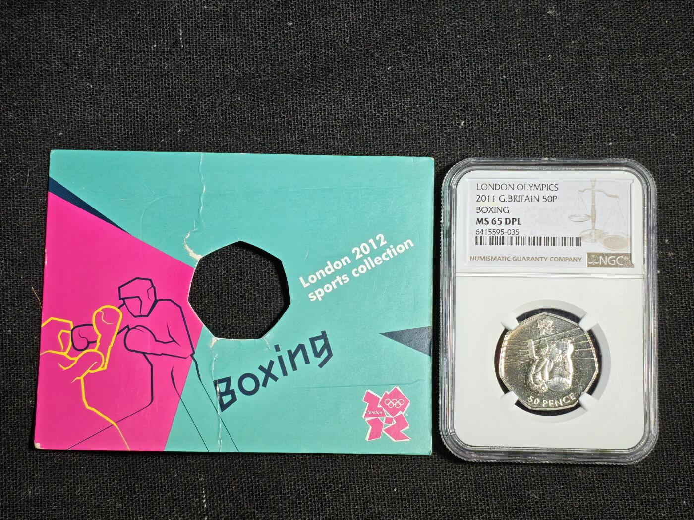 刘世昌艺术品销售中心～虎踞龙蟠*金杨在线联拍群第512期 英国2011年“奥运会～拳击”纪念币（NGC  MS65DPL  串号：6415595-035）1枚，原册。