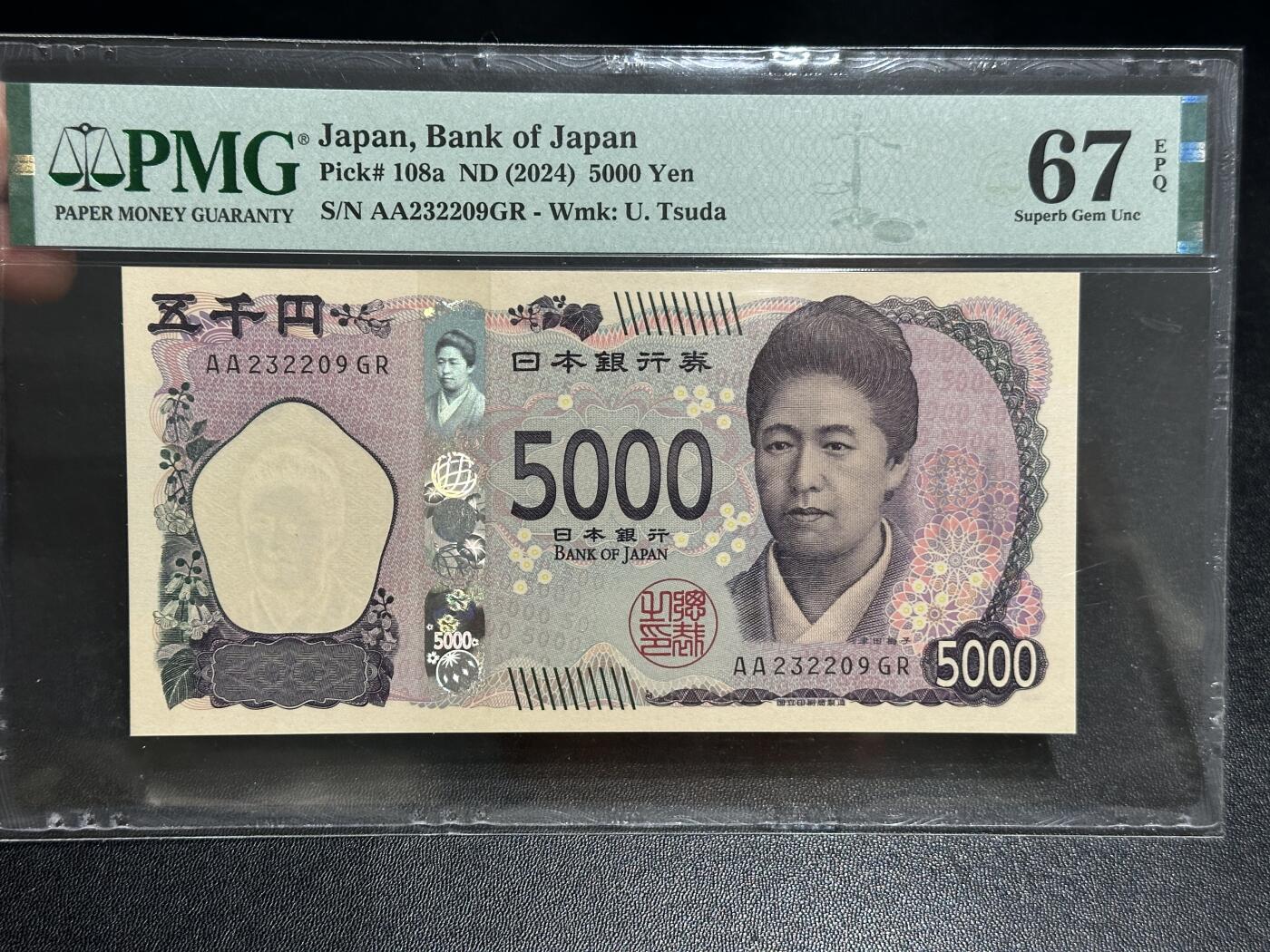 《外钞收藏家》第五百九十四期（畅拍场）（本平台长期征集拍品、欢迎藏友们联系合作） 2024年日本最新版5000日元 津田美子 AA冠 无47 PMG67