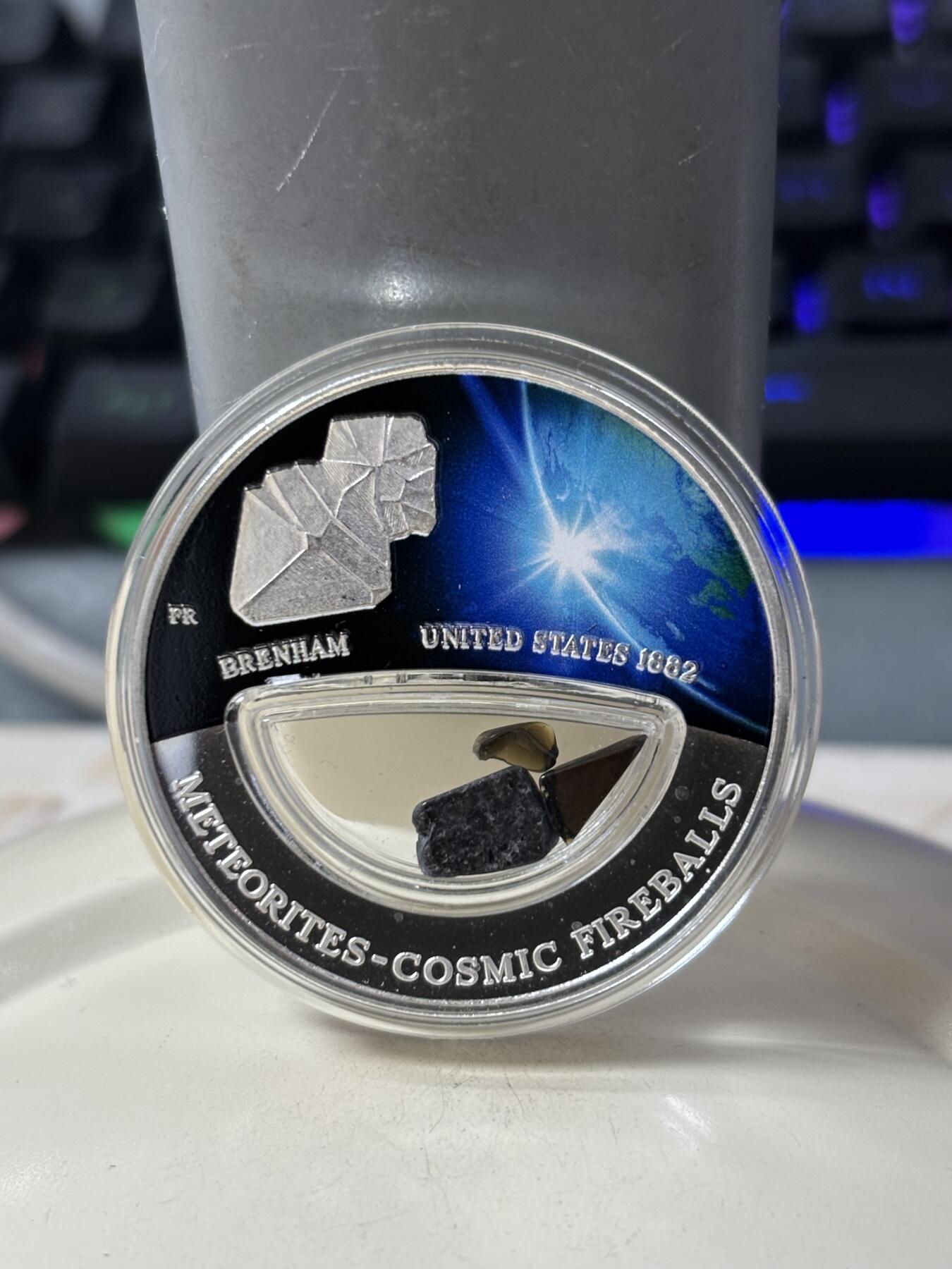 第186期拍卖 斐济2012年世界陨石系列镶嵌美国布伦纳姆陨石银币，999银，20克，发行999枚