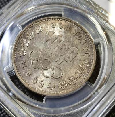 甄臻铺-世界币章拍卖（第44期）精品场拍品征集中，送拍享返佣金等优惠多多 PCGS-MS66 1964年日本大奥1000日元，油亮包浆极美，高分包浆难觅