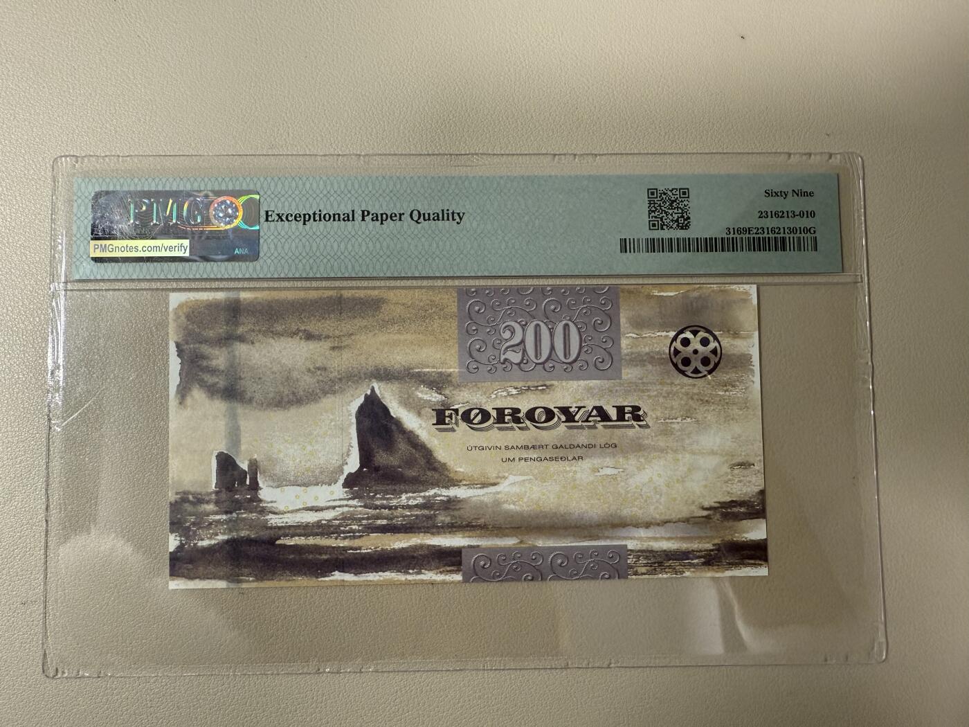 【礼羽收藏】🌏世界钱币拍卖第117期 【C011A065912A】2011年法罗200面值纸币 无47号码 PMG69