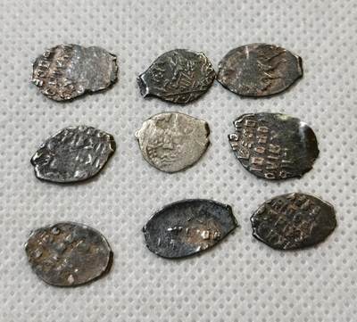 甄臻铺-世界币章拍卖（第44期）精品场拍品征集中，送拍享返佣金等优惠多多 沙俄1700-1717年彼得一世1戈比打制银币9枚 鱼鳞币 打制银币 少见品种，细节见图