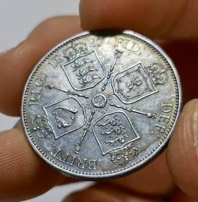 甄臻铺-世界币章拍卖（第44期）精品场拍品征集中，送拍享返佣金等优惠多多 UNC品相英国1887福林银币，原光带彩好状态，现在好品相的裸币不太好找了，细节见图