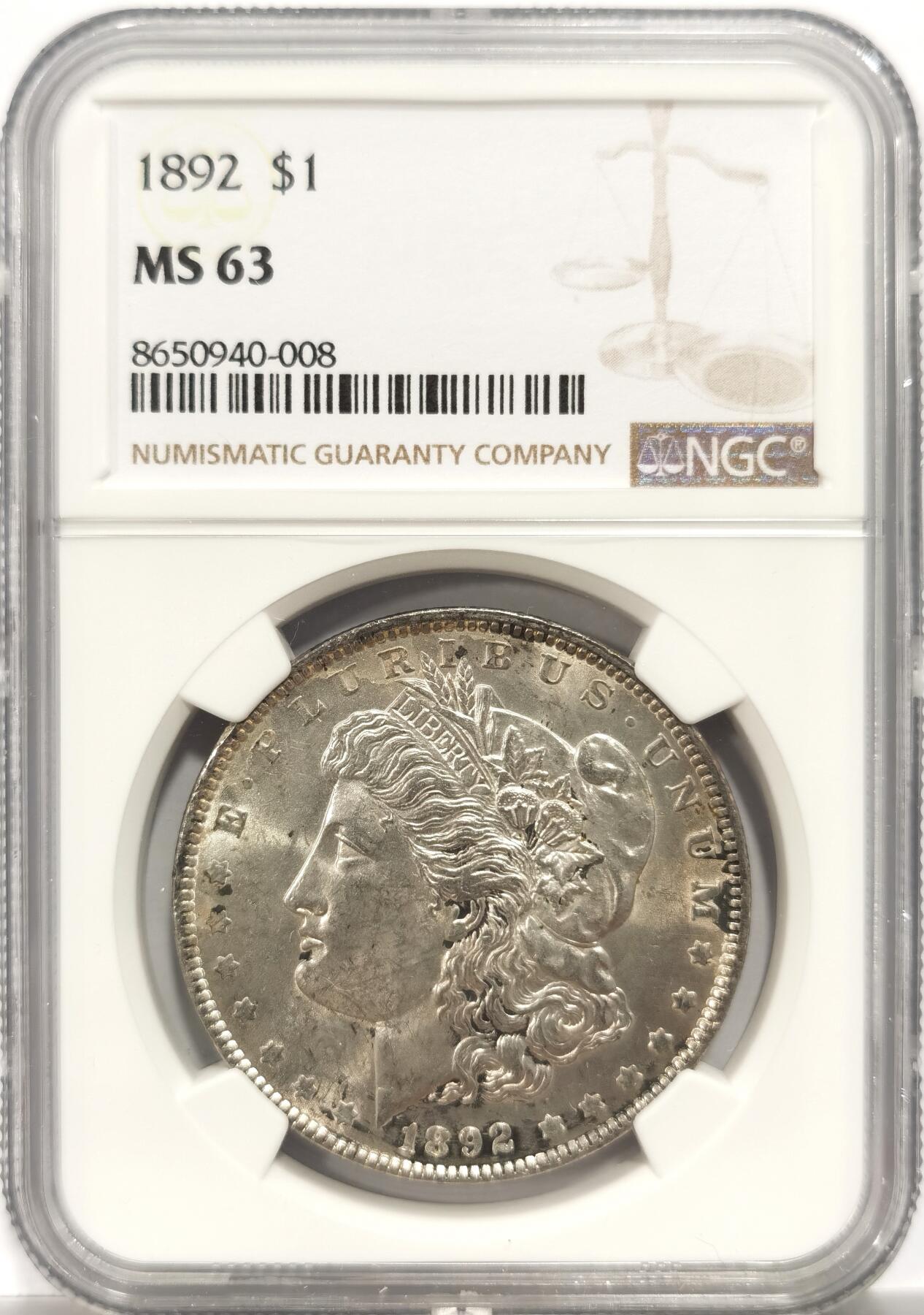博洋堂世界钱币拍卖第153期（全场包邮） NGC MS63 美国1892年摩根 此版是费城铸币厂发行量第二低的年份 仅次于大珍1895“摩根王”由于法案的大量熔毁和糟糕的储存方式 使得此版高分极为难得 此枚双面转光强烈 佐以好品相 是极佳的收藏品 上月博洋堂同分数含佣成交价6000+