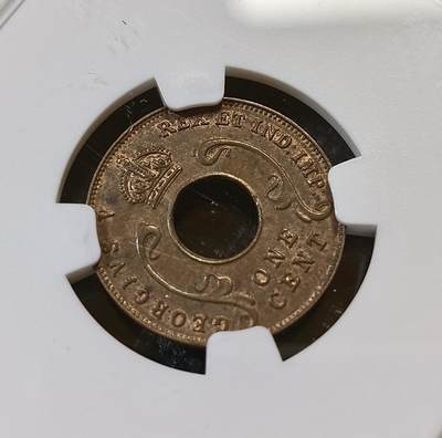 甄臻铺-世界币章拍卖（第44期）精品场拍品征集中，送拍享返佣金等优惠多多 NGC-MS62BN 英属东非中孔一分，有趣的中孔币，铜光满溢，状态非常好，经典殖民地品种