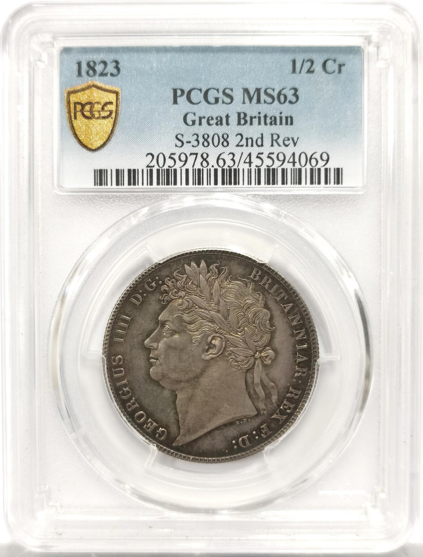 博洋堂世界钱币拍卖第153期（全场包邮） PCGS MS63 英国1823年乔四半克朗，稀少盾徽版，比1820少太多，币面完美，深打欧洲老彩包浆，绝美收藏级天花板